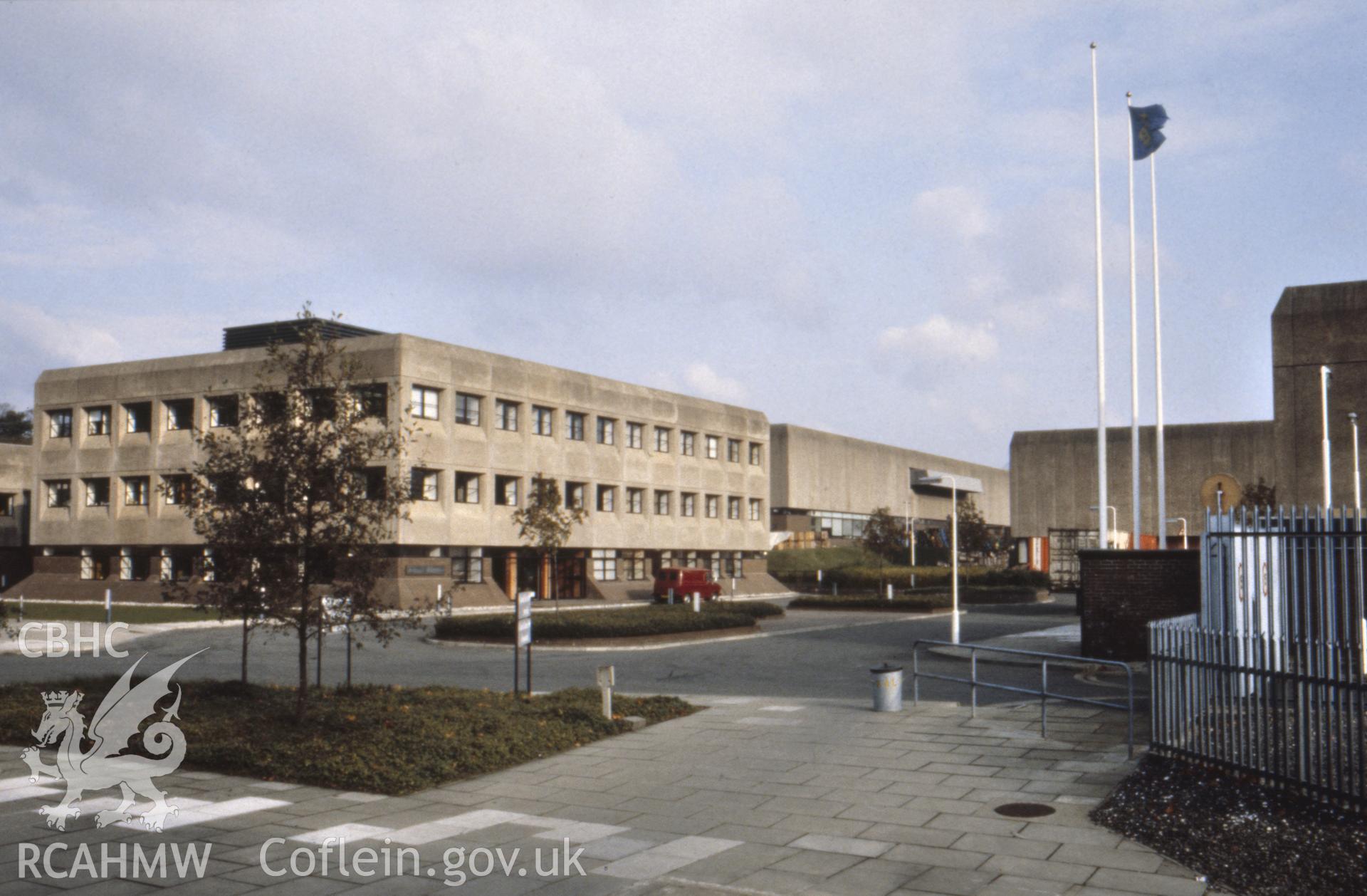 1 colour transparency showing exterior view of the Royal Mint, Llantrisant; collated by the former Central Office of Information.