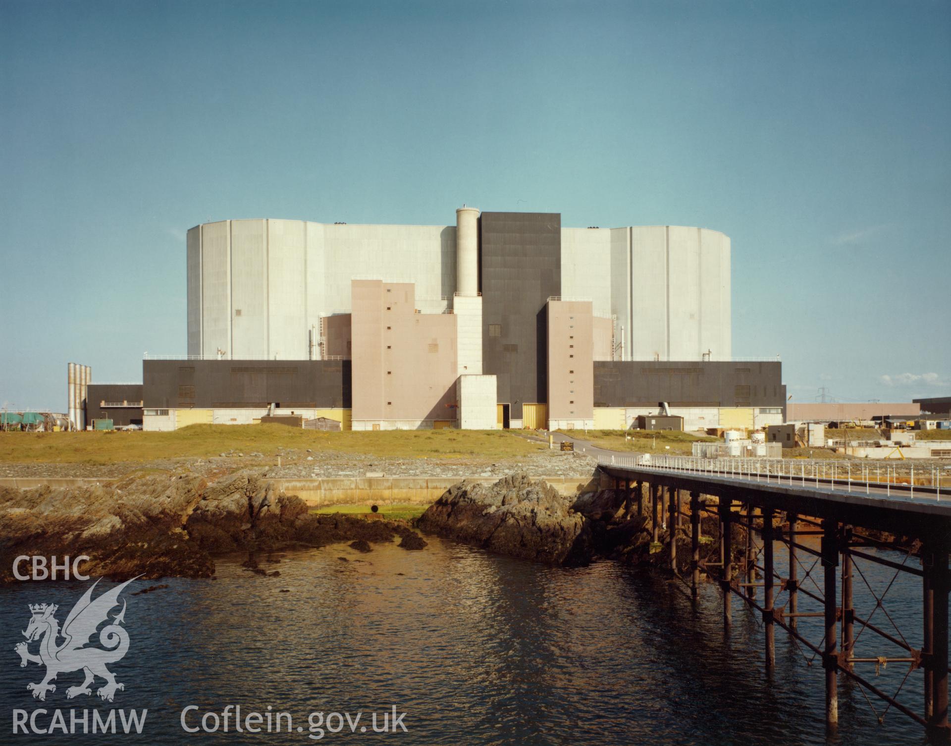 1 b/w print showing exterior view of Wylfa Power Station; collated by the former Central Office of Information.