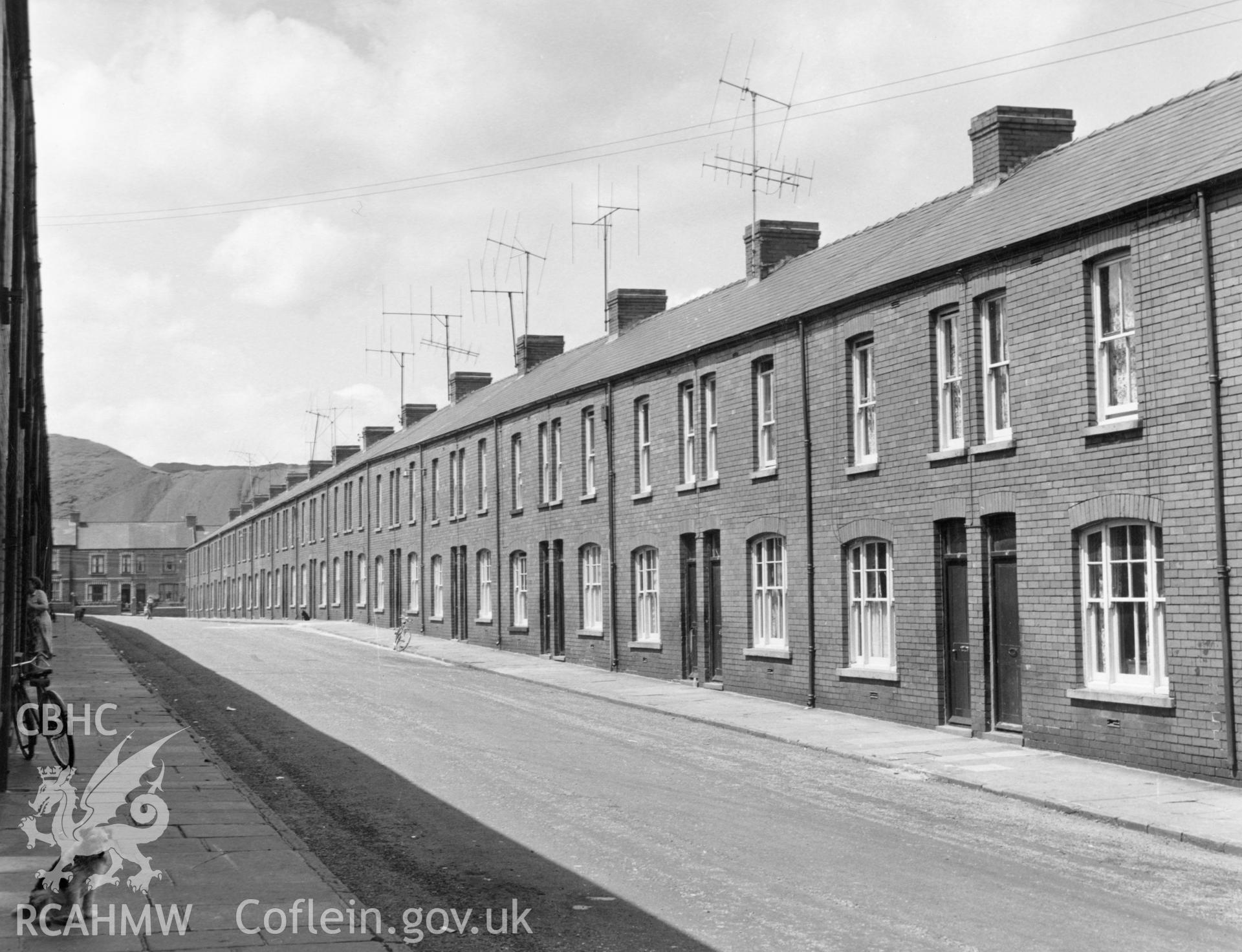 1 b/w print showing exterior of Council Street, Ebbw Vale, used as an illustration of the Housing Improvement Grant scheme for exhibitions held at Ministry of Housing stands at agricultural shows (1960); collated by the former Central Office of Information.