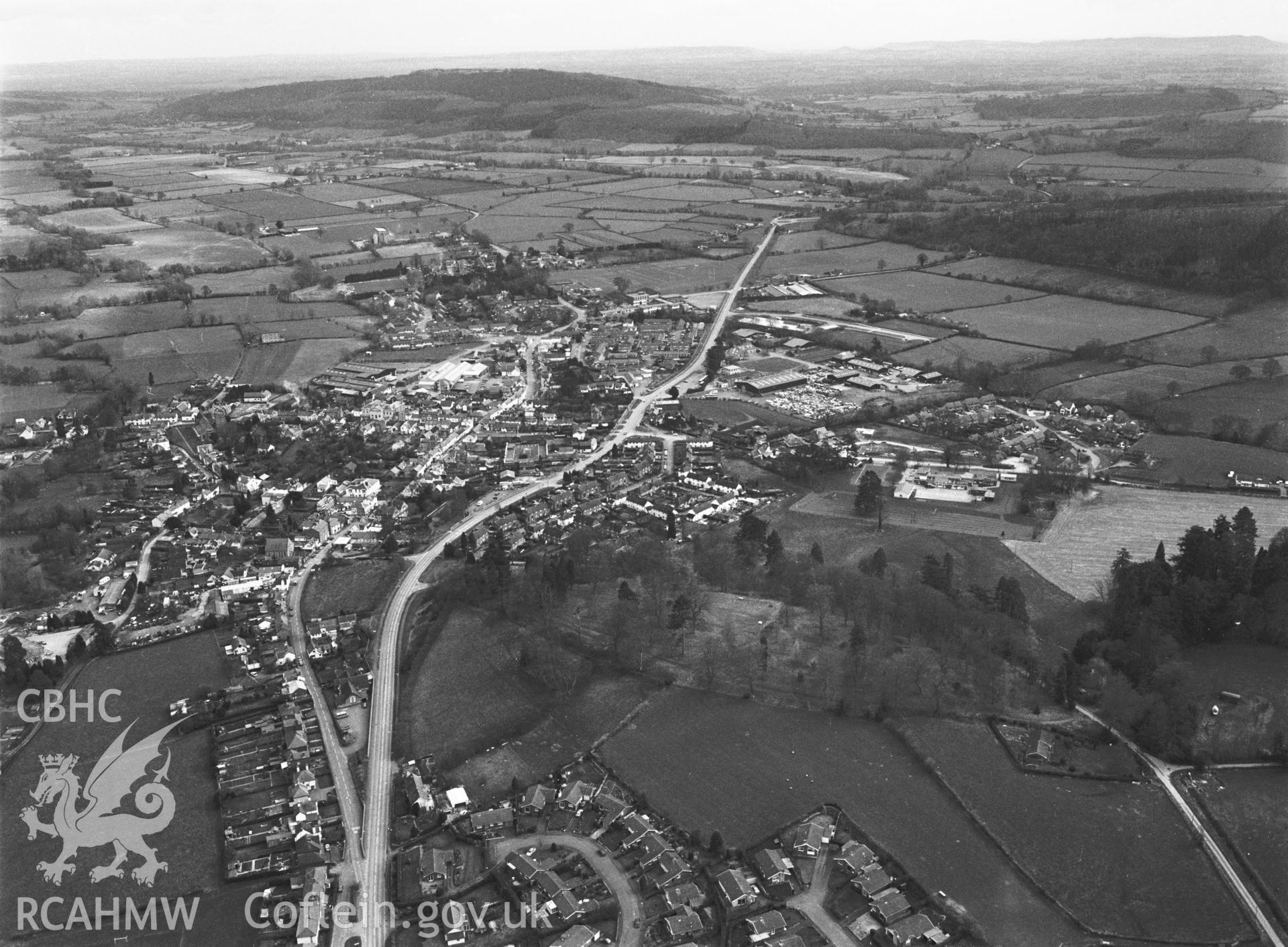 RCAHMW Black and white oblique aerial photograph of Presteigne, taken on 14/03/1999 by CR Musson