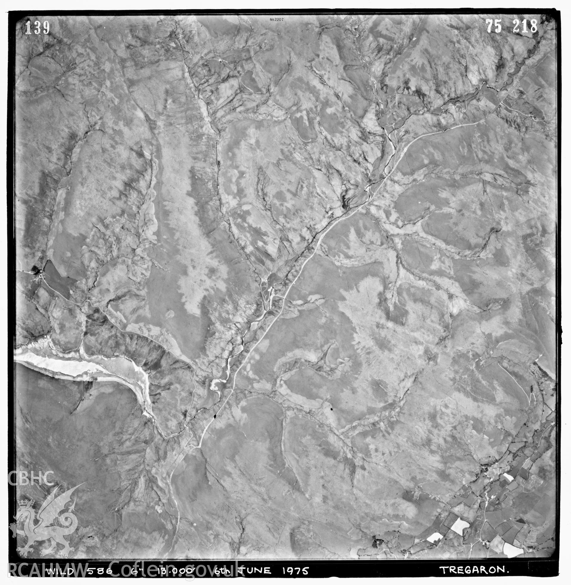 Digitized copy of an aerial photograph showing the Tregaron area SN87/97, taken by Ordnance Survey, 1975.