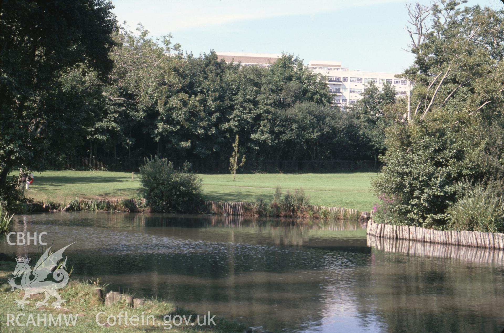 Colour photographic transparency showing Singleton Boating Lake, Swansea University; collated by the former Central Office of Information.