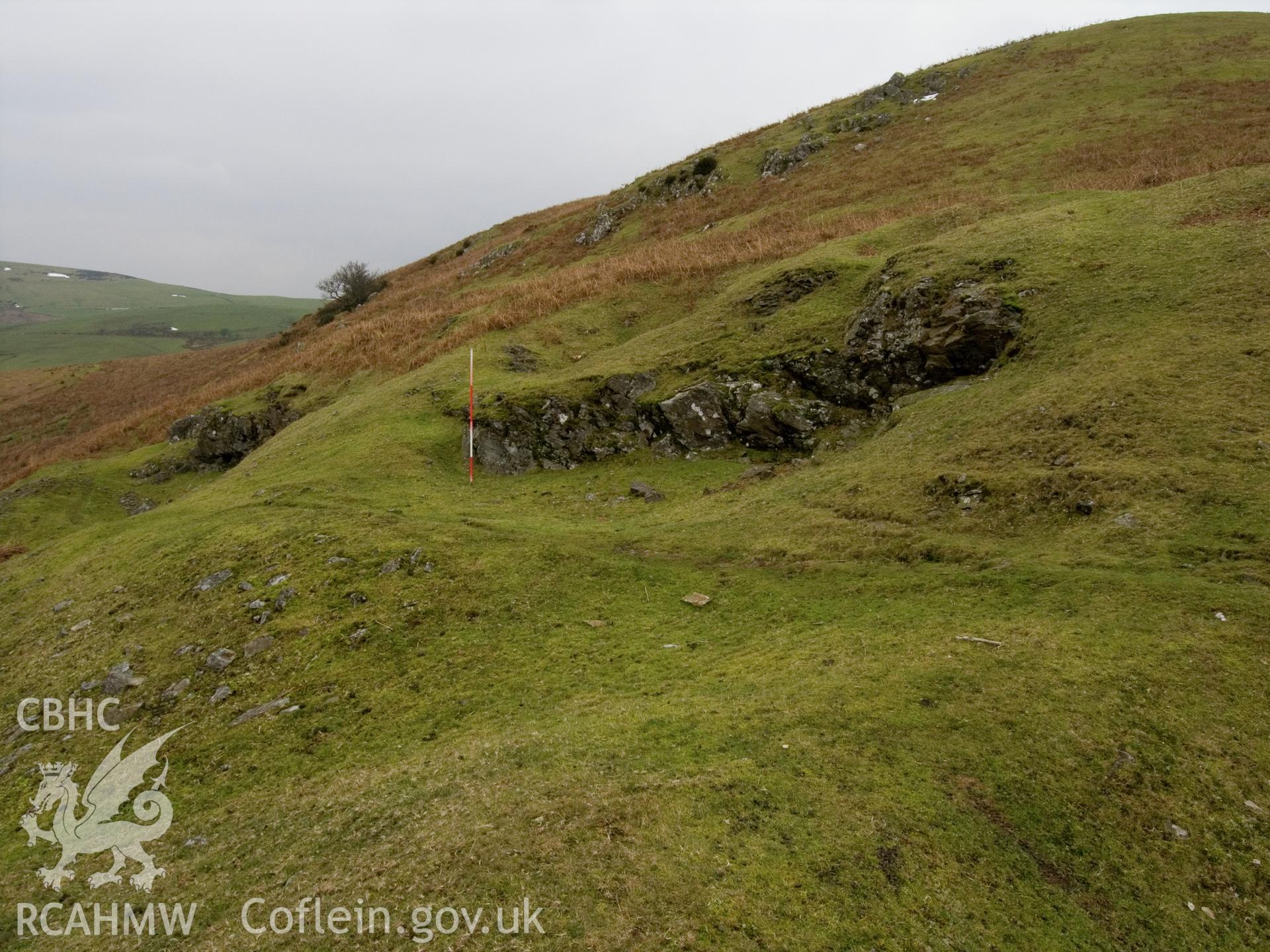 view looking N of exposed bedrock at N end of quarry.