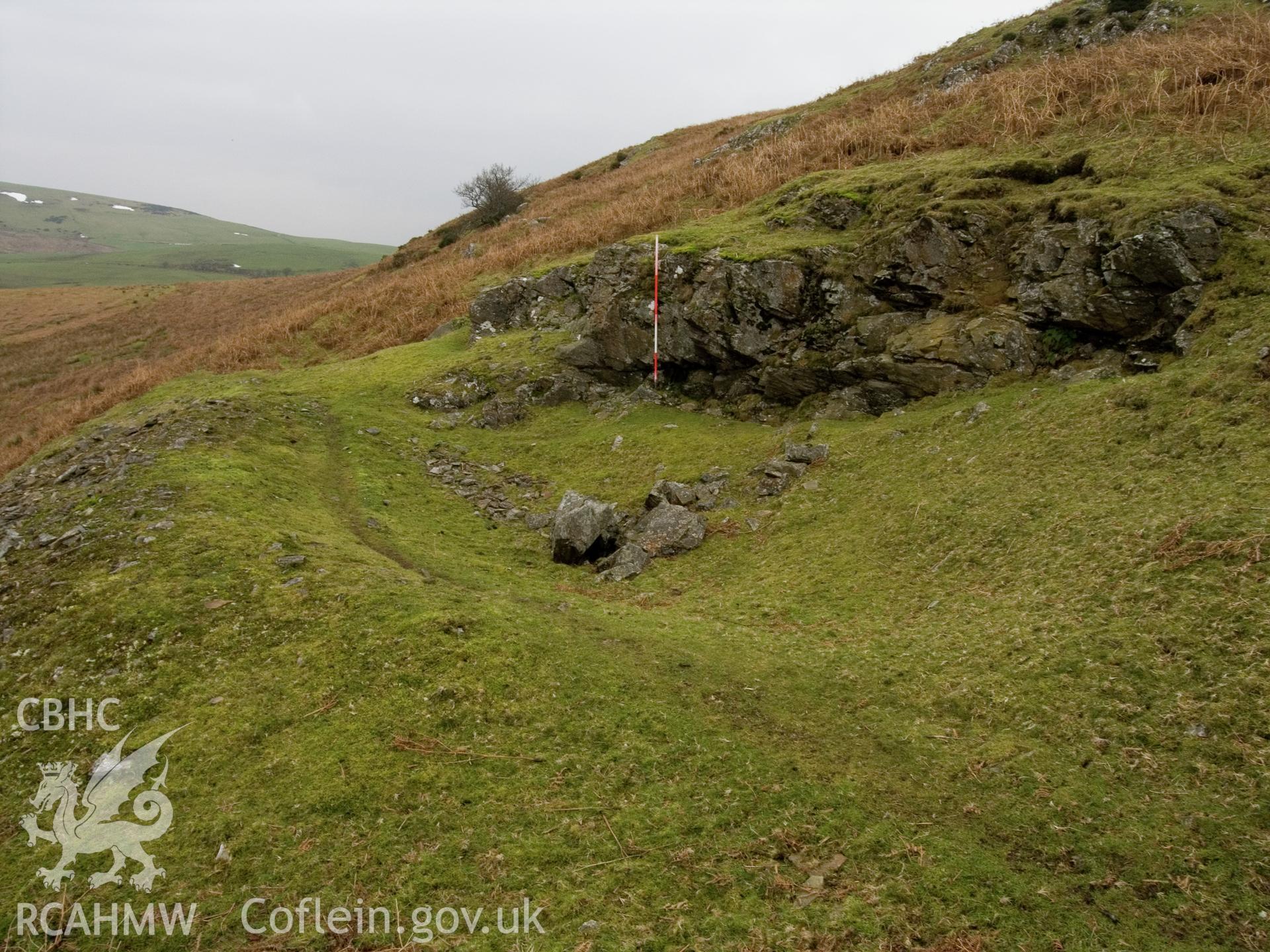view looking N of exposed bedrock at N end of quarry.