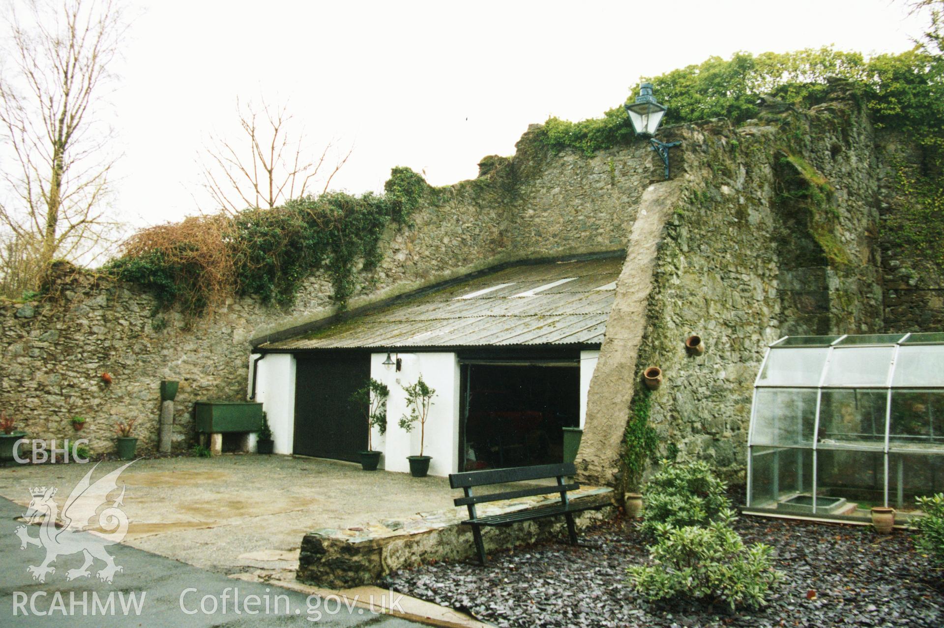 Colour photograph showing buttressed walls at Min y Twr Tower, Cwm Cadnant (possible fives court); taken during Cadw listed building resurvey programme, organised alphabetically by Old County and Community.