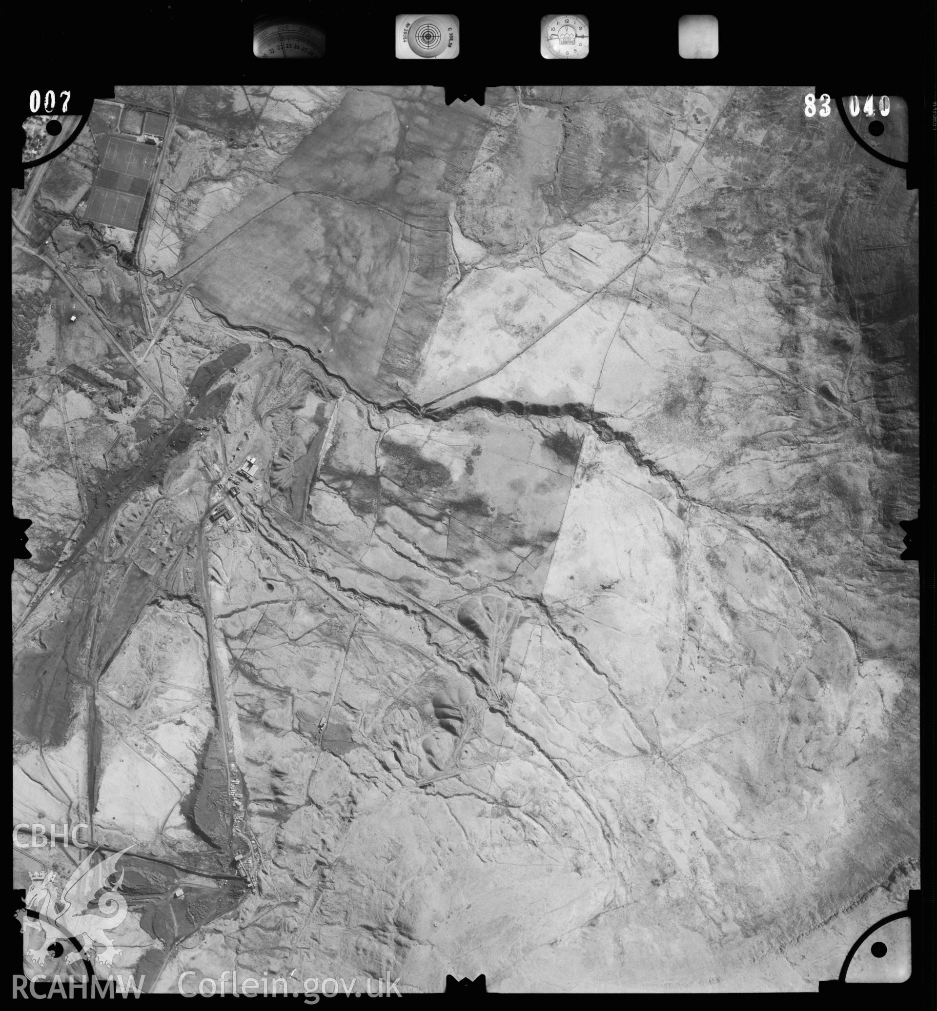 Digitized copy of an aerial photograph showing the area around Tower Drift Mine, Hirwaun, taken by Ordnance Survey, 1983.