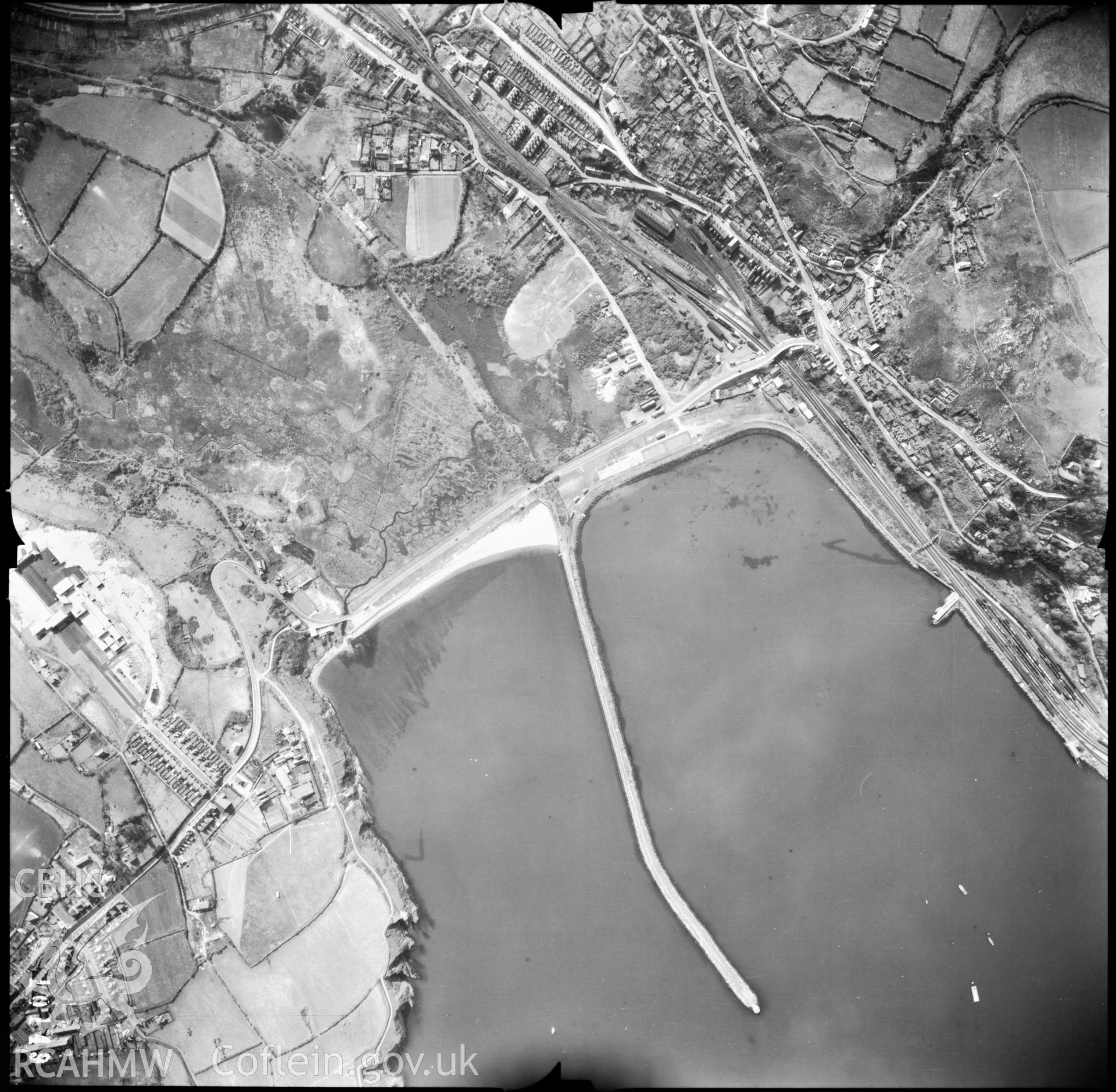 Goodwick Harbour; digitized copy of an aerial photograph taken April 1954 produced by Meridian for Ordnance Survey, loaned for copying by Derek Elliott of the Central Register of Aerial Photography