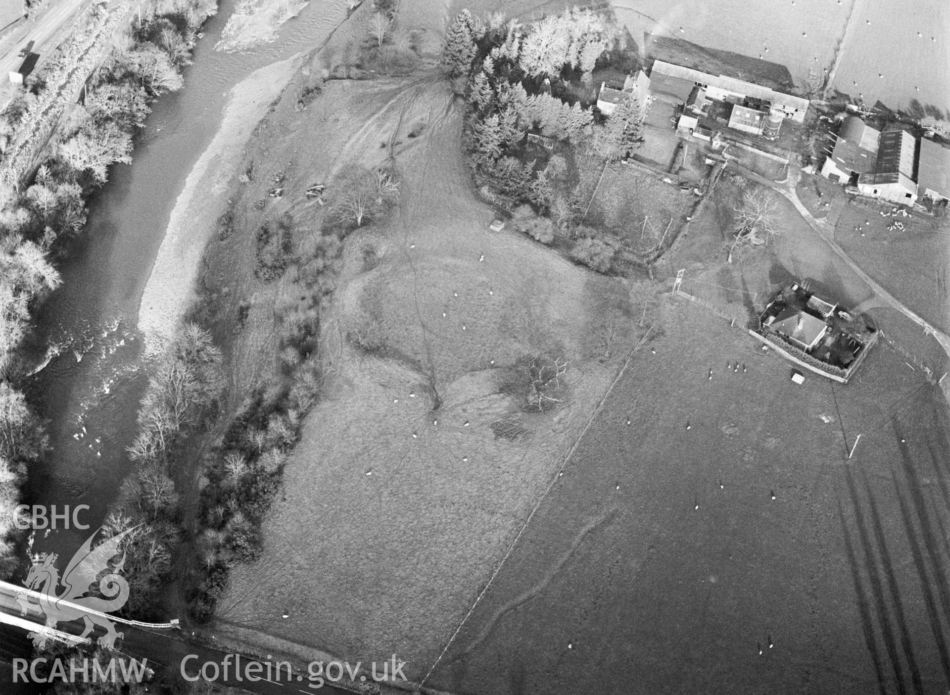 RCAHMW Black and white oblique aerial photograph of Bryn Derwen Castle, Llandyssil, taken on 20/12/1998 by CR Musson