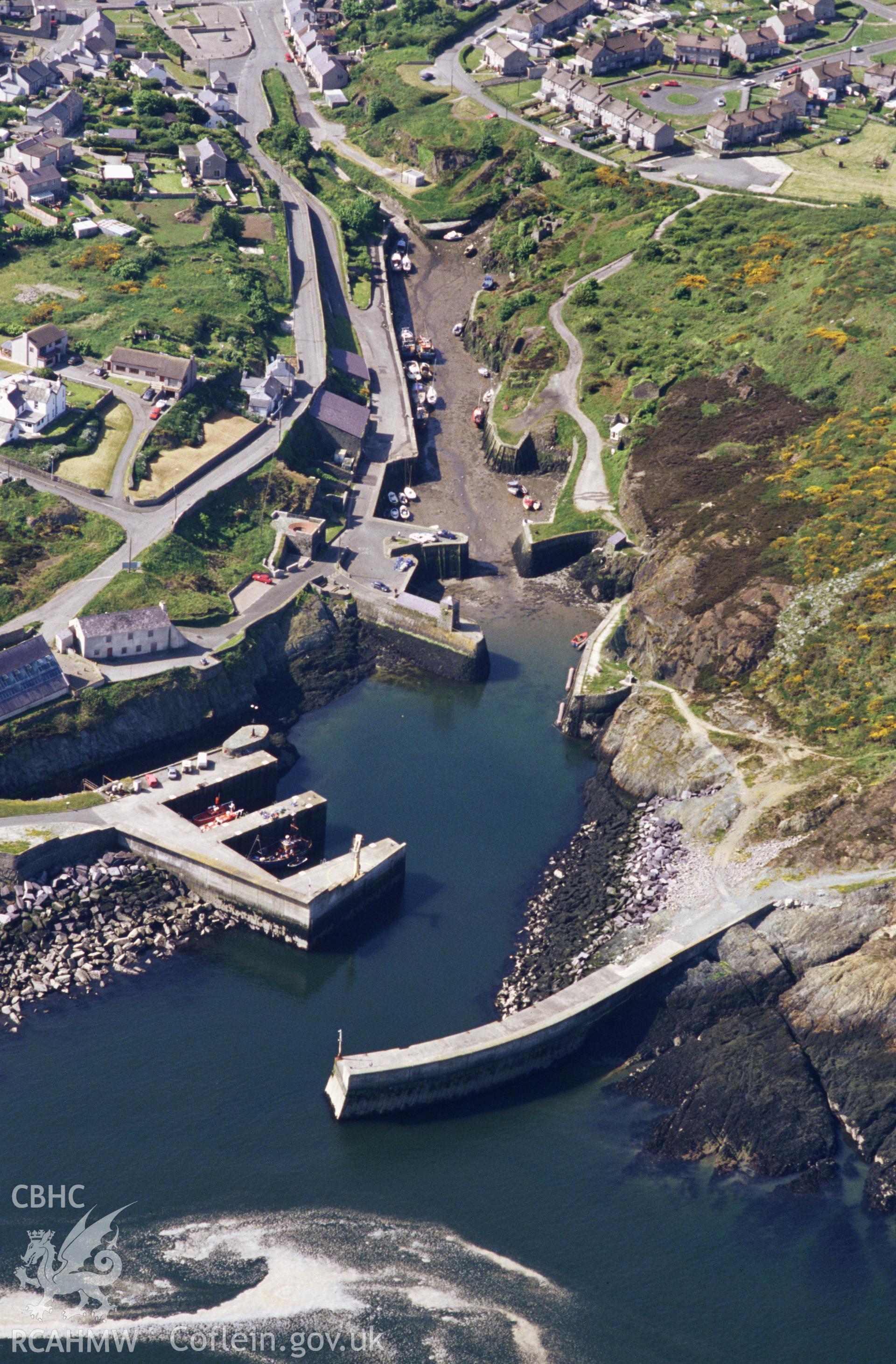 RCAHMW colour slide oblique aerial photograph of Amlwch Breakwater and Harbour, taken by C.R. Musson, 30/05/94