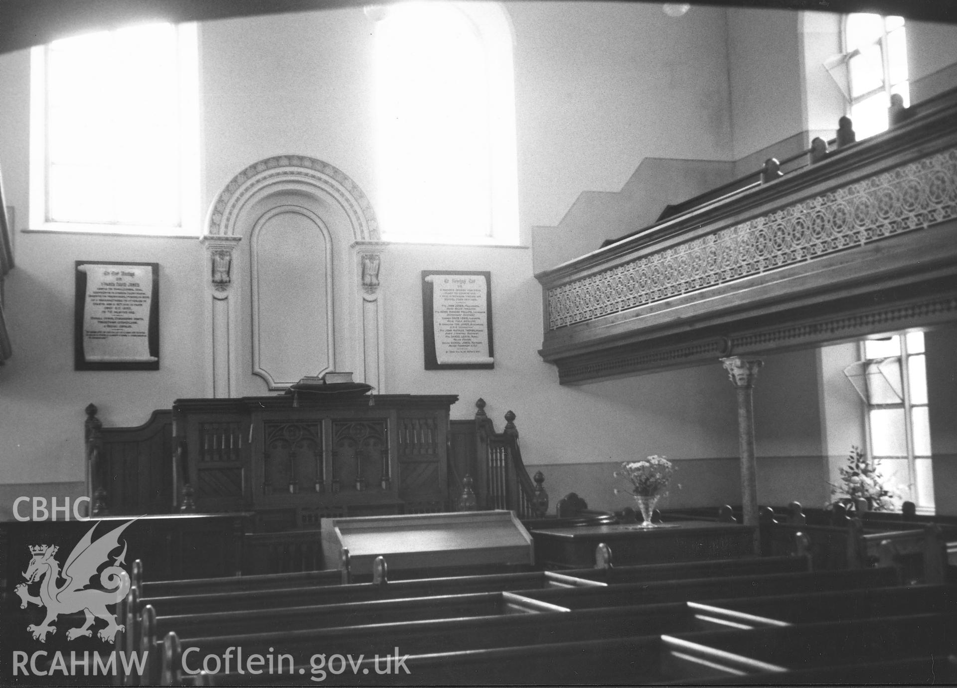 Digital copy of a black and white photograph showing an interior view of Gwernllwyn Independent Chapel, Llandyfriog, taken by Robert Scourfield, 1995.