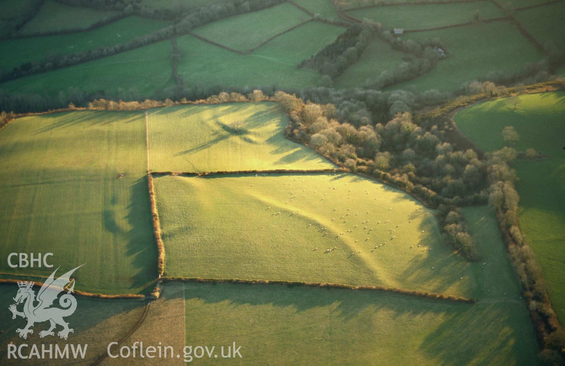 RCAHMW colour oblique aerial photograph of Broadway camp, and Pilcornswell camp beyond, in very low winter light. Taken by Toby Driver on 10/01/2003