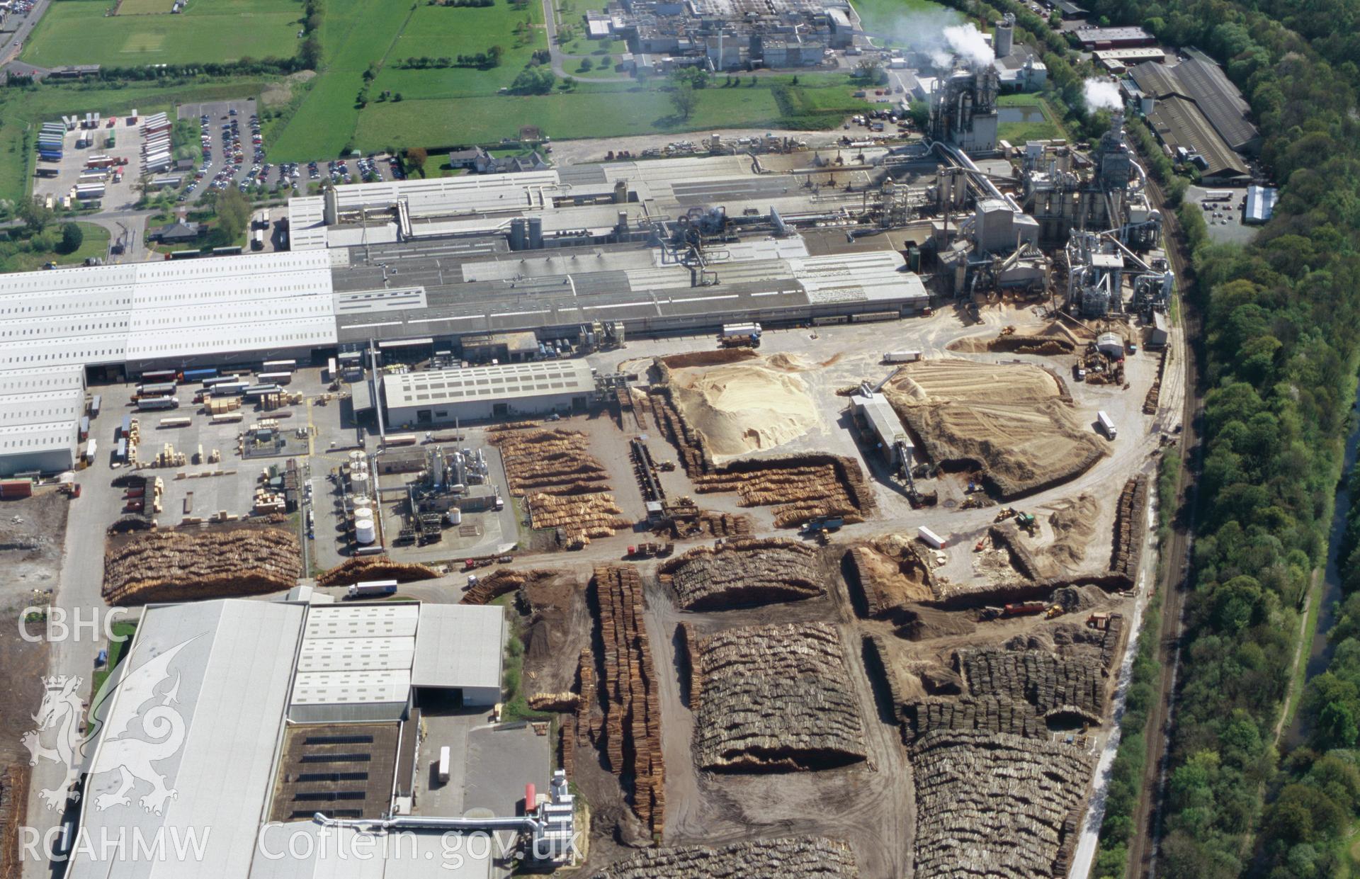 RCAHMW colour slide oblique aerial photograph of Woodchip Factory, Chirk, taken by T.G. Driver, 2006.