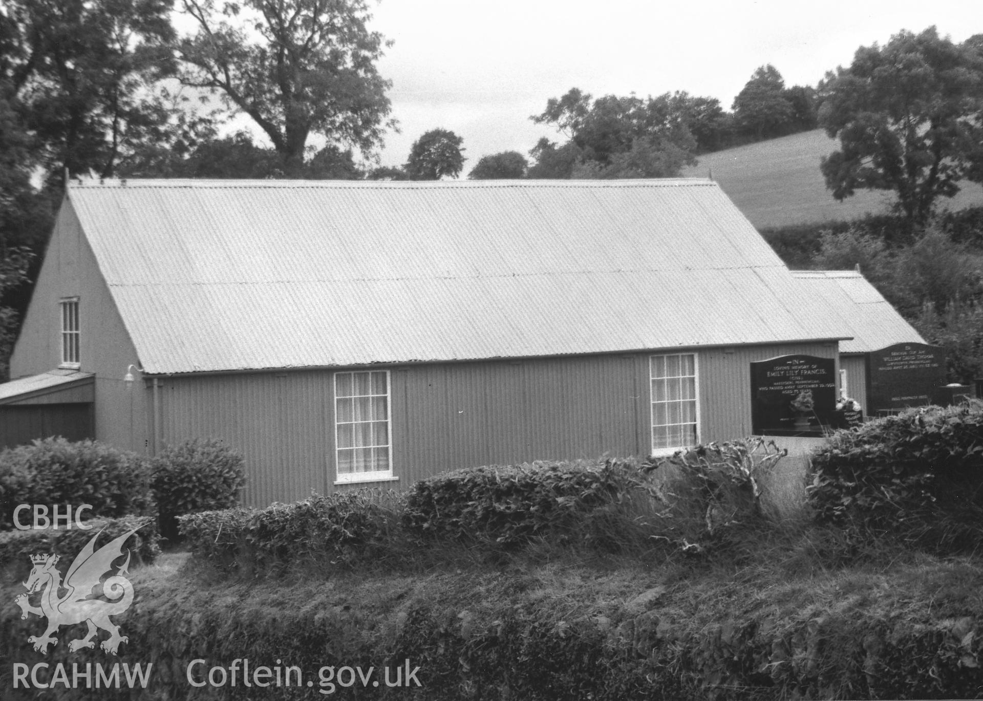 Digital copy of a black and white photograph showing an exterior view of Gwernllwyn Sunday School, Llandyfriog, taken by Robert Scourfield, 1995.