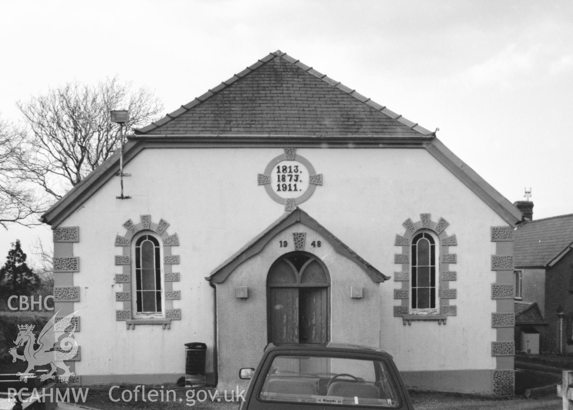 Digital copy of a black and white photograph showing exterior view of Wiston Chapel, taken by Robert Scourfield, 1996.