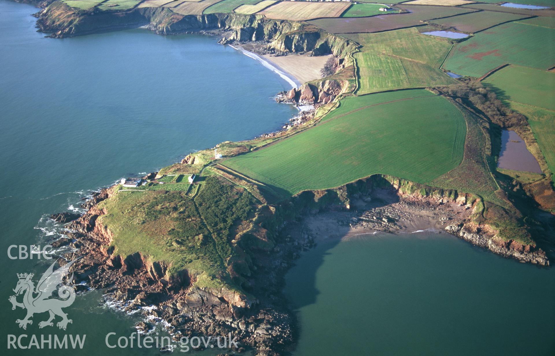 RCAHMW colour slide oblique aerial photograph of Great Castle Head, Enclosure, St Ishmael's, taken by T.G.Driver on the 03/12/1997