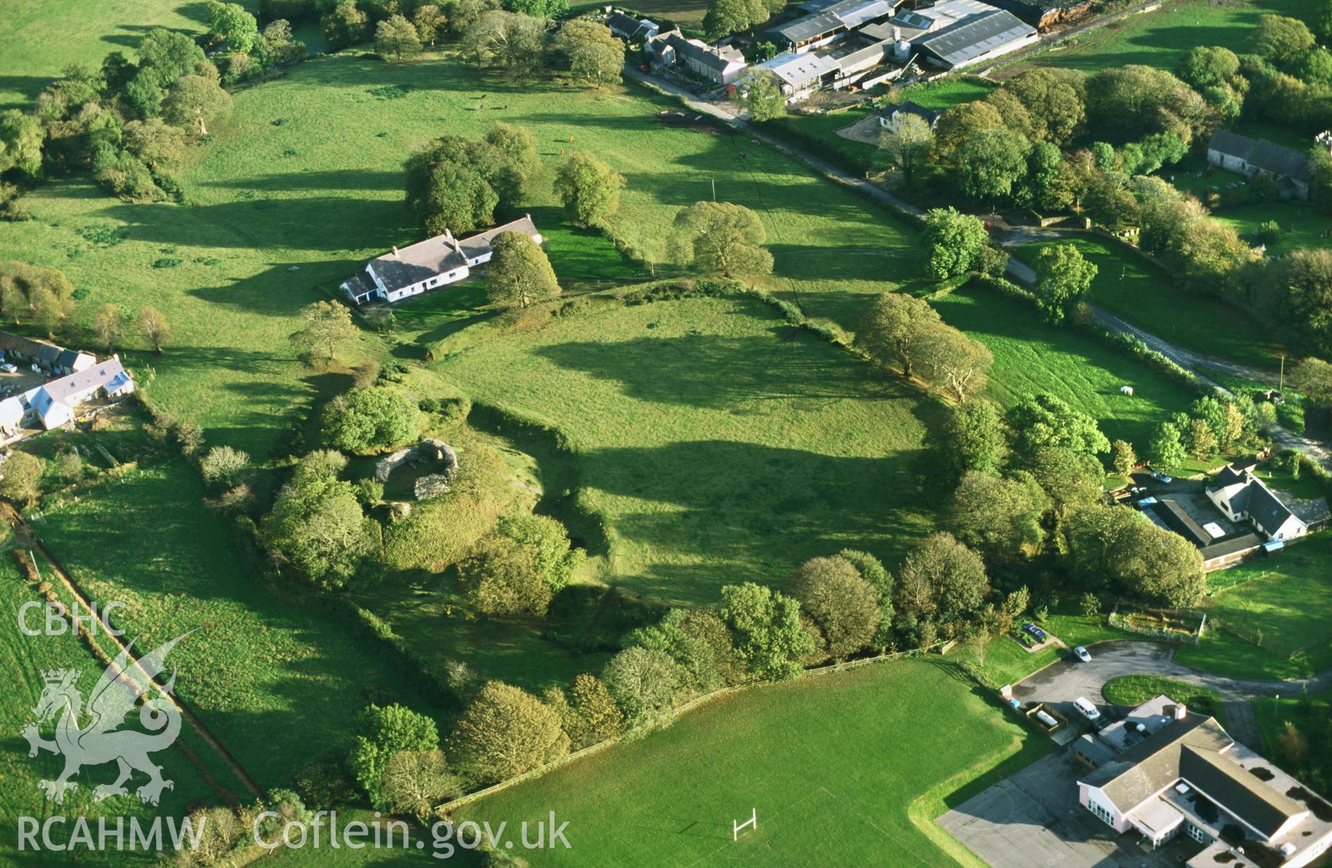 RCAHMW colour oblique aerial photograph of Wiston Castle, in low evening sunlight. Taken by Toby Driver on 18/10/2002