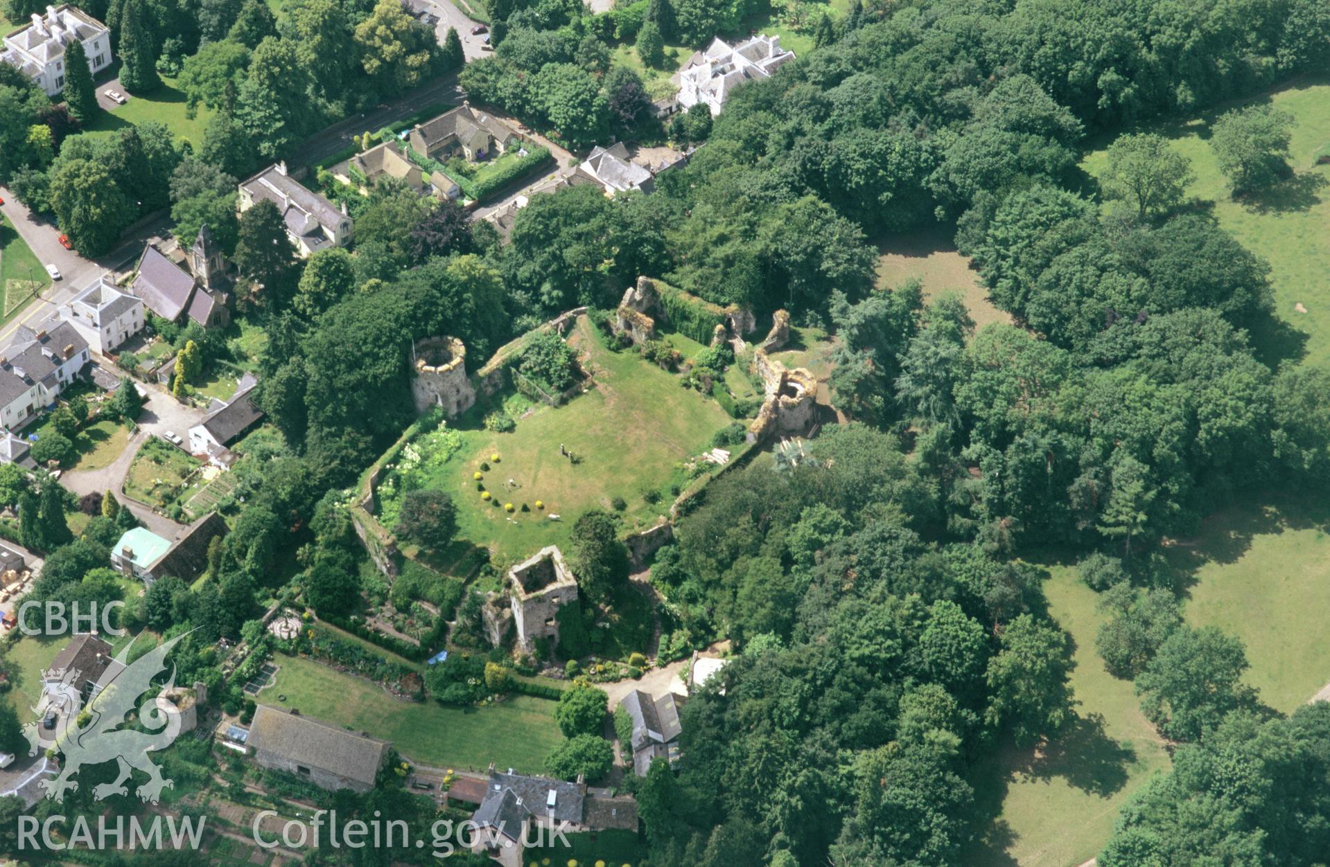 RCAHMW colour slide oblique aerial photograph of the castle, Usk, taken by C.R.Musson on the 11/07/1996