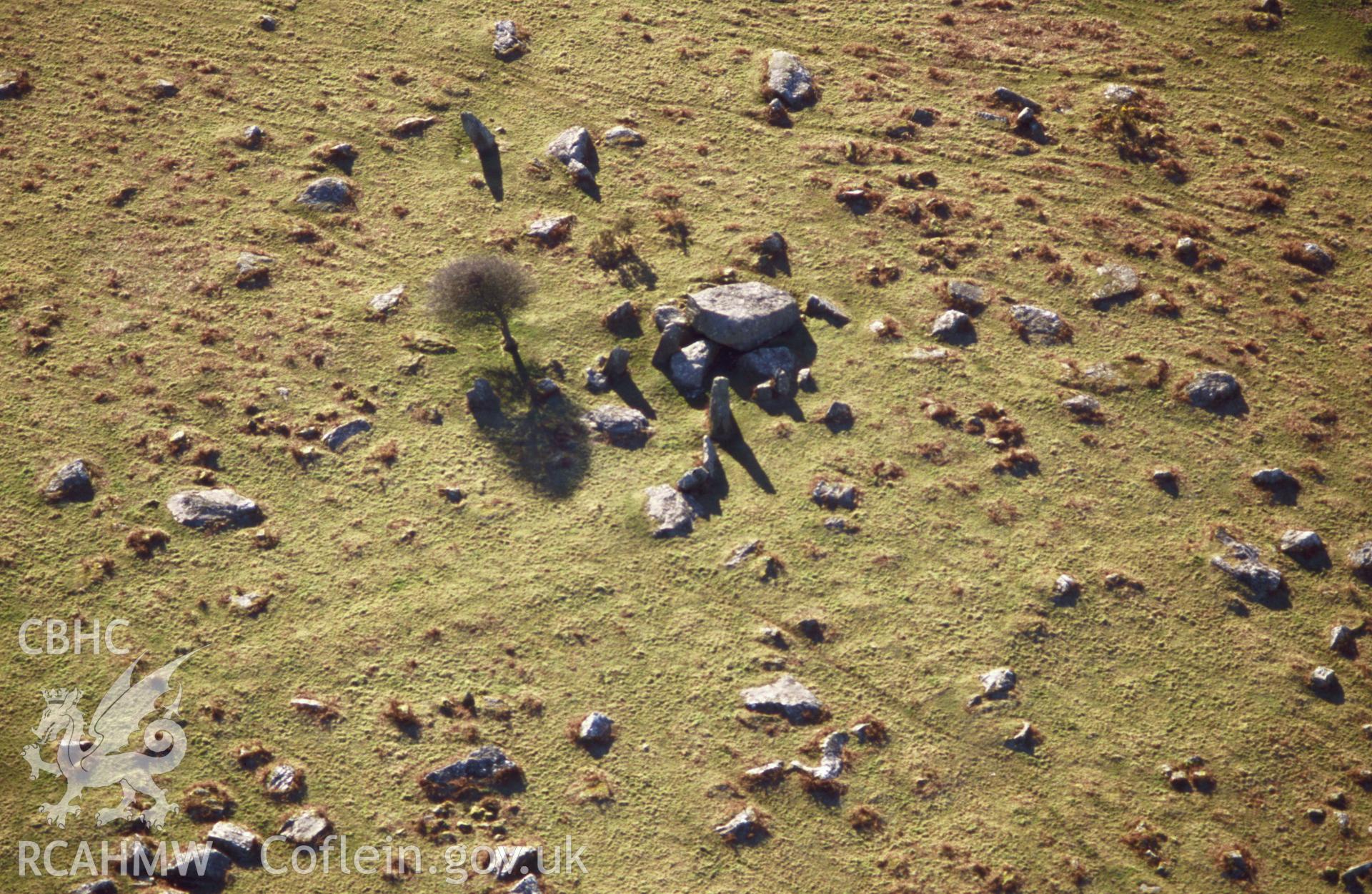 Slide of RCAHMW colour oblique aerial photograph of Carn Turne Chambered Tomb, Wolfcastle, taken by Toby Driver, 2004.