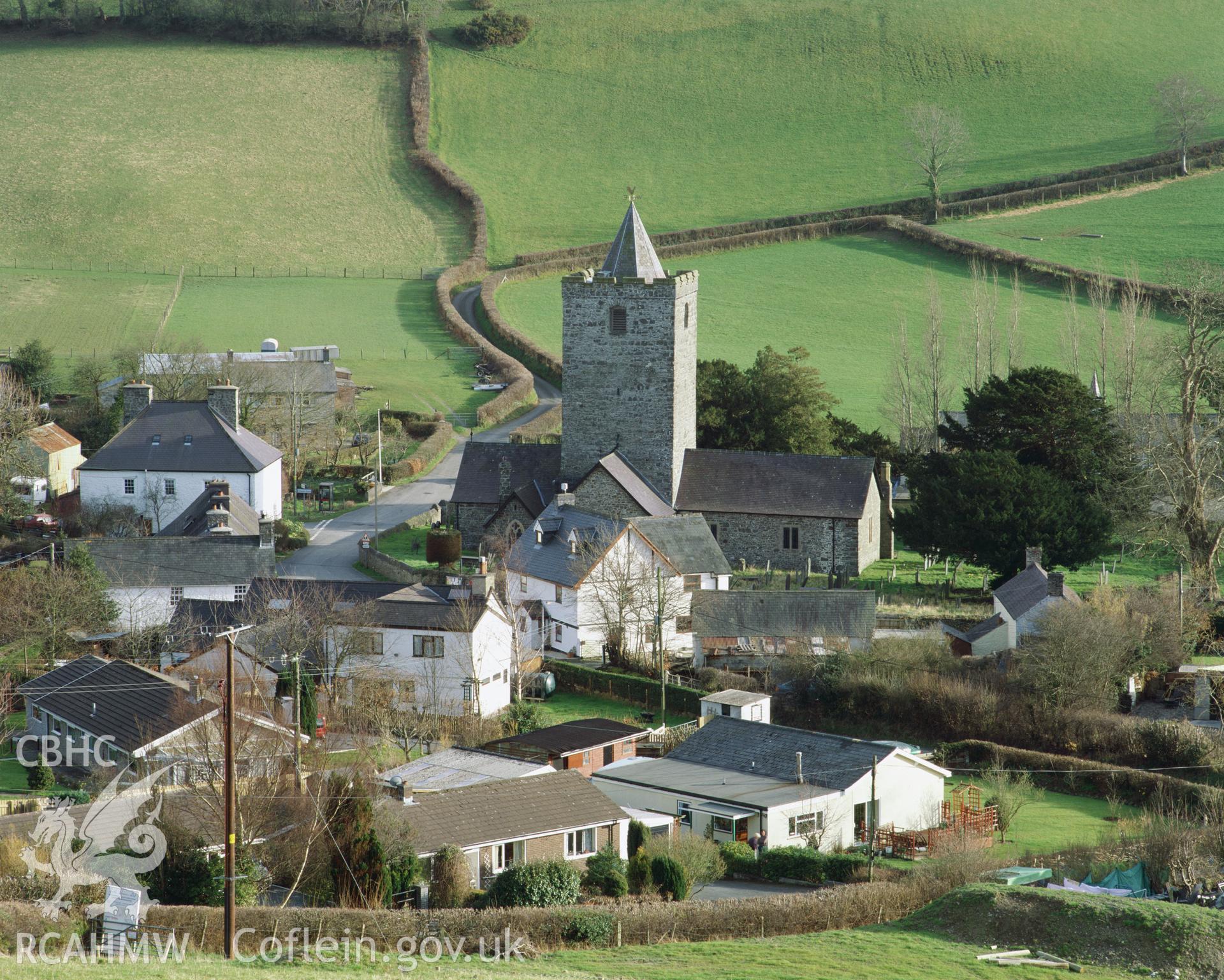 Colour transparency showing a general view of Llanfihangel y Creuddyn, produced by Iain Wright, June 2004.
