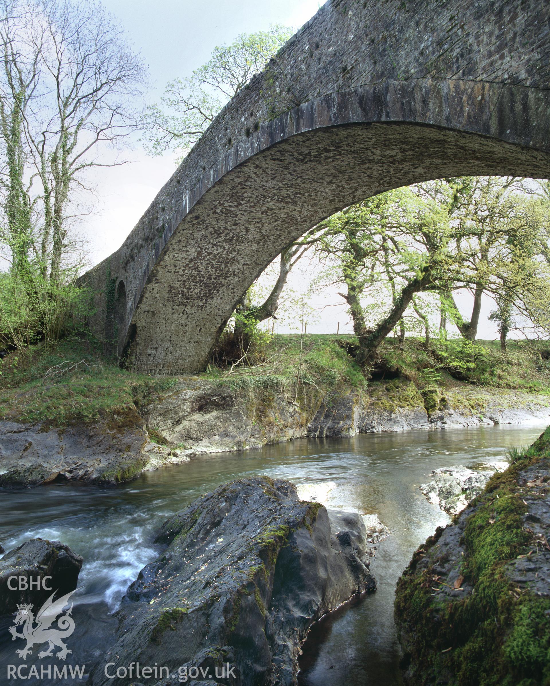 Colour transparency showing a view of Pont Dolauhirion, Llandovery, produced by Iain Wright, June 2004