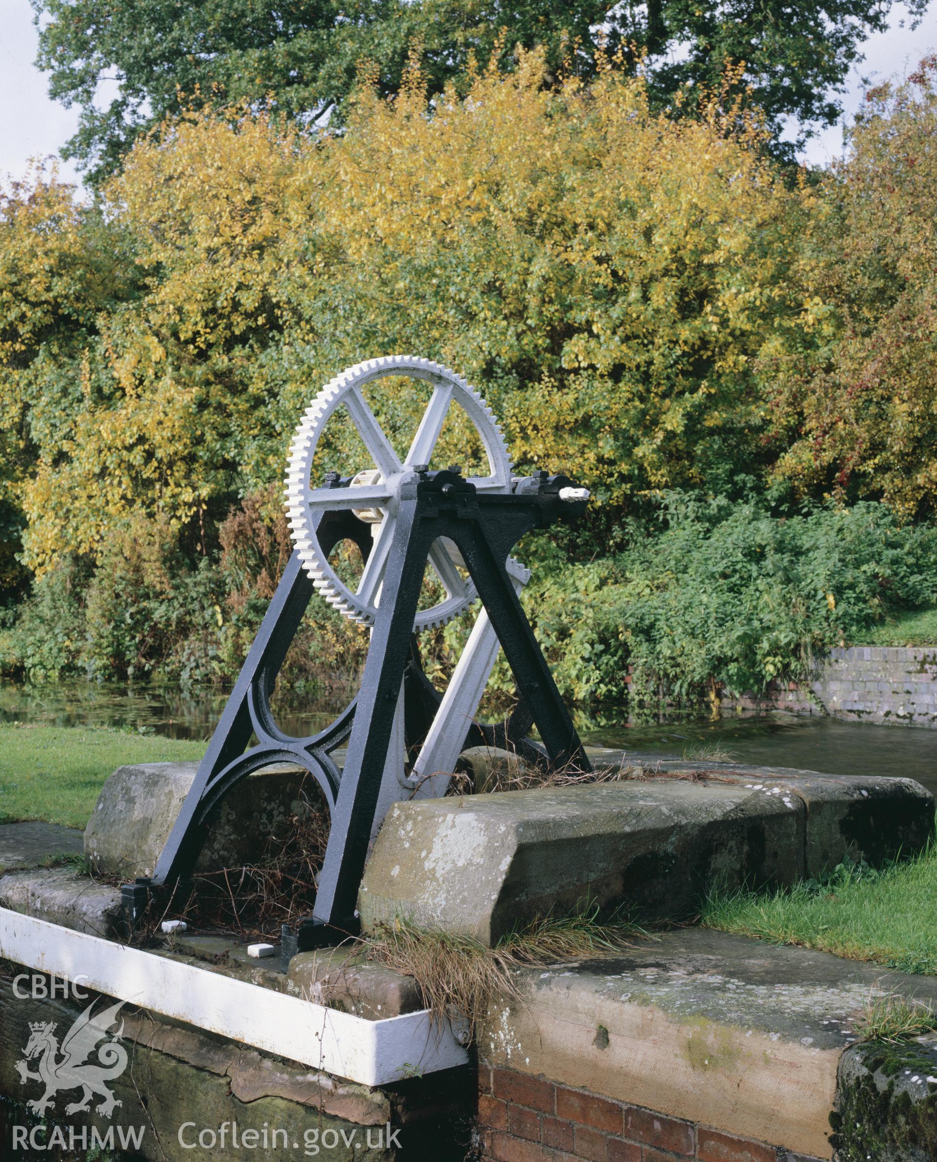 Colour transparency showing a view of the gearing mechanism at Belan Lock, Welshpool, produced by Iain Wright 1980