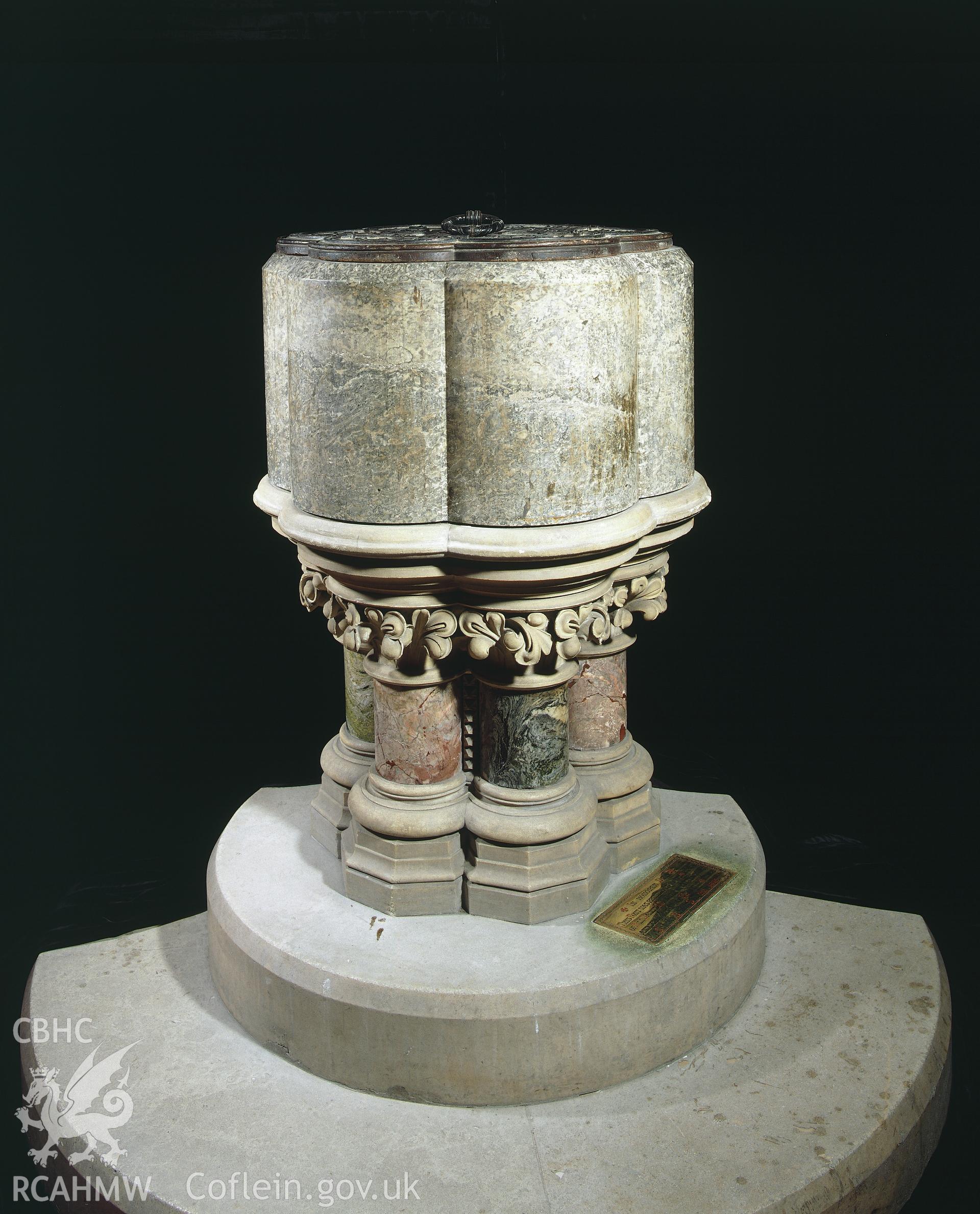 RCAHMW colour transparency showing view of the font at All Saints Church, Llanelli.