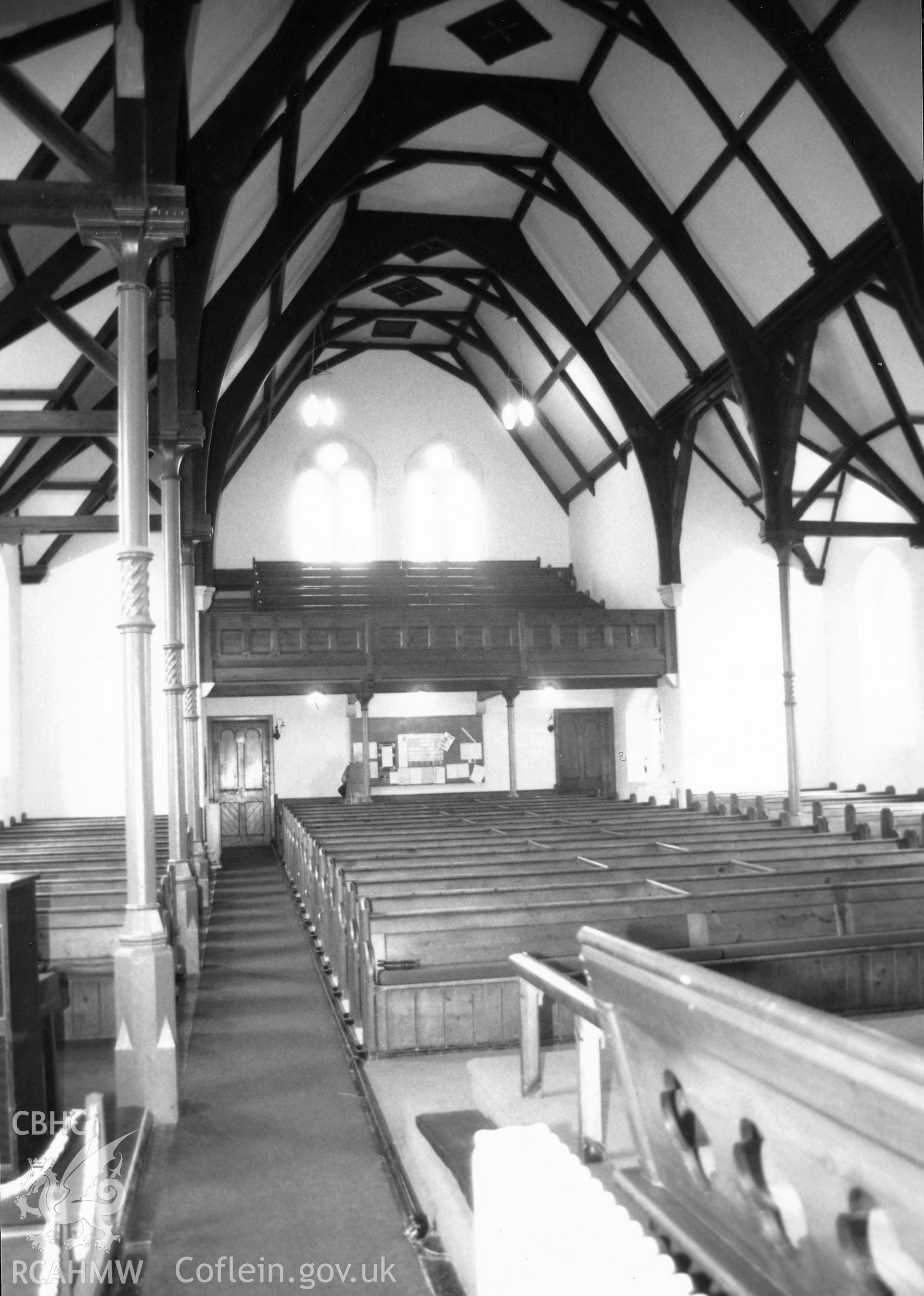 Digital copy of a black and white photograph showing an interior view of St John's Congregational Chapel, Tenby, taken by Robert Scourfield, 1995.