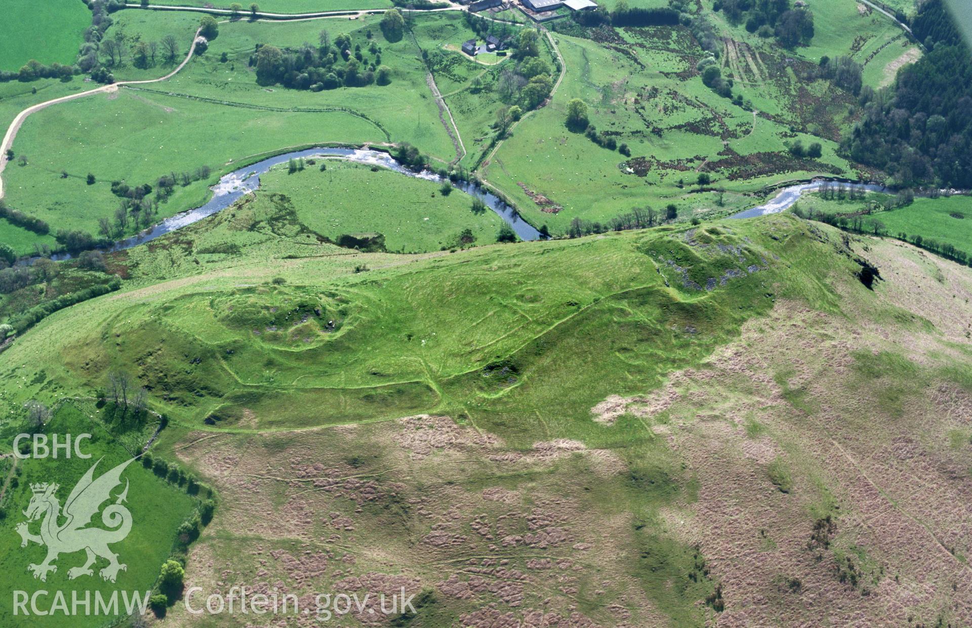 RCAHMW colour oblique aerial photograph of Cefnllys Castle, poor light and shadow. Taken by Toby Driver on 16/05/2002