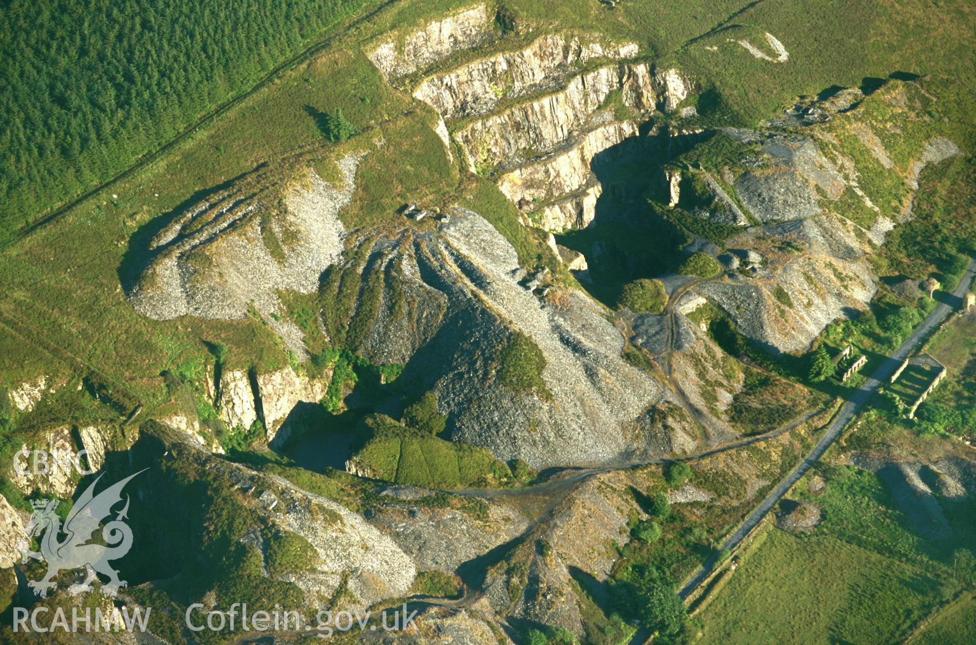 RCAHMW colour slide oblique aerial photograph of Precelly Quarry, Maenclochog, taken by C.R.Musson on the 15/07/1996
