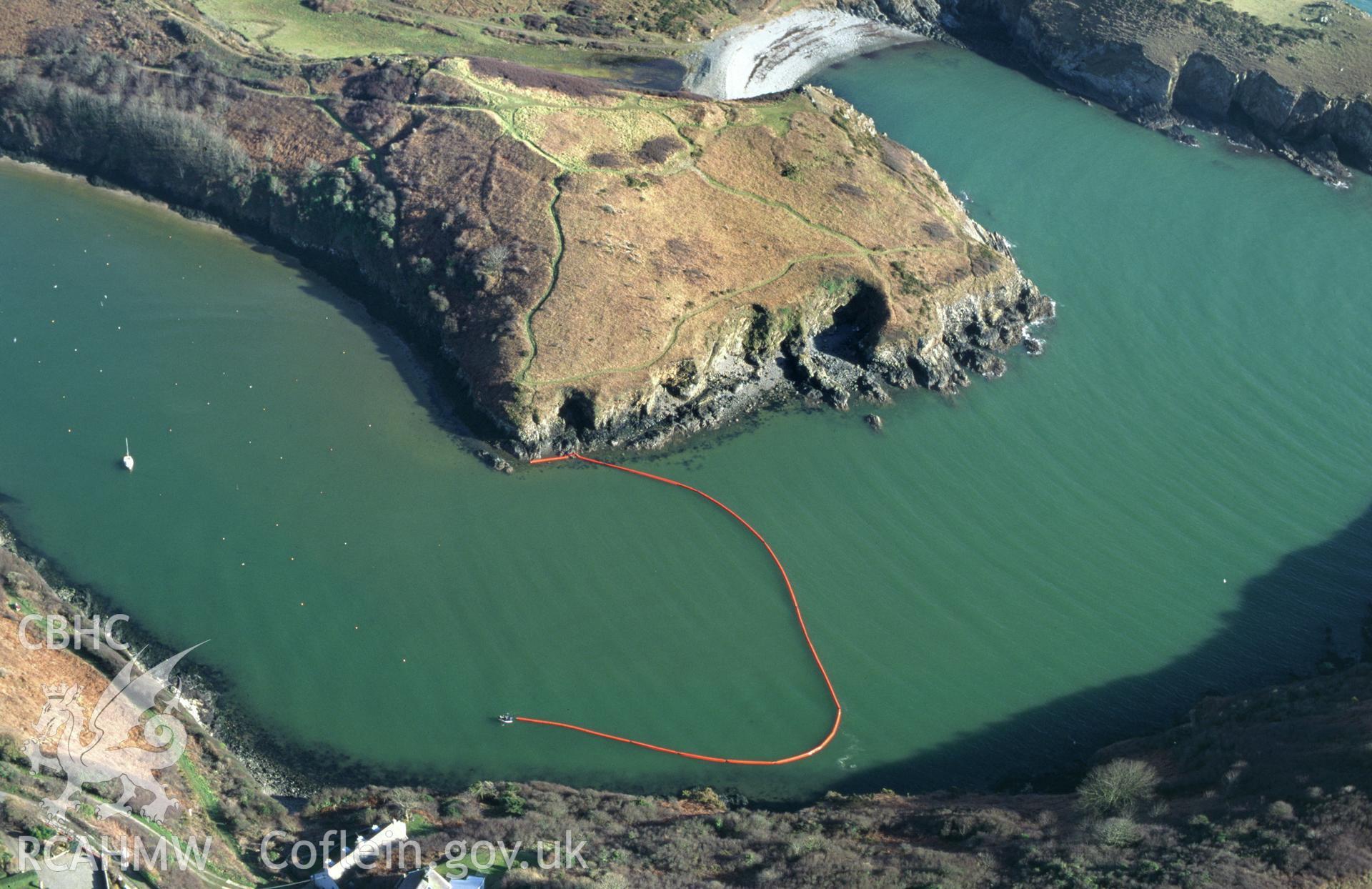 RCAHMW colour slide oblique aerial photograph of promontory fort S of Solva Harbour, Gribin, Solva, taken by C.R.Musson on the 27/02/1996
