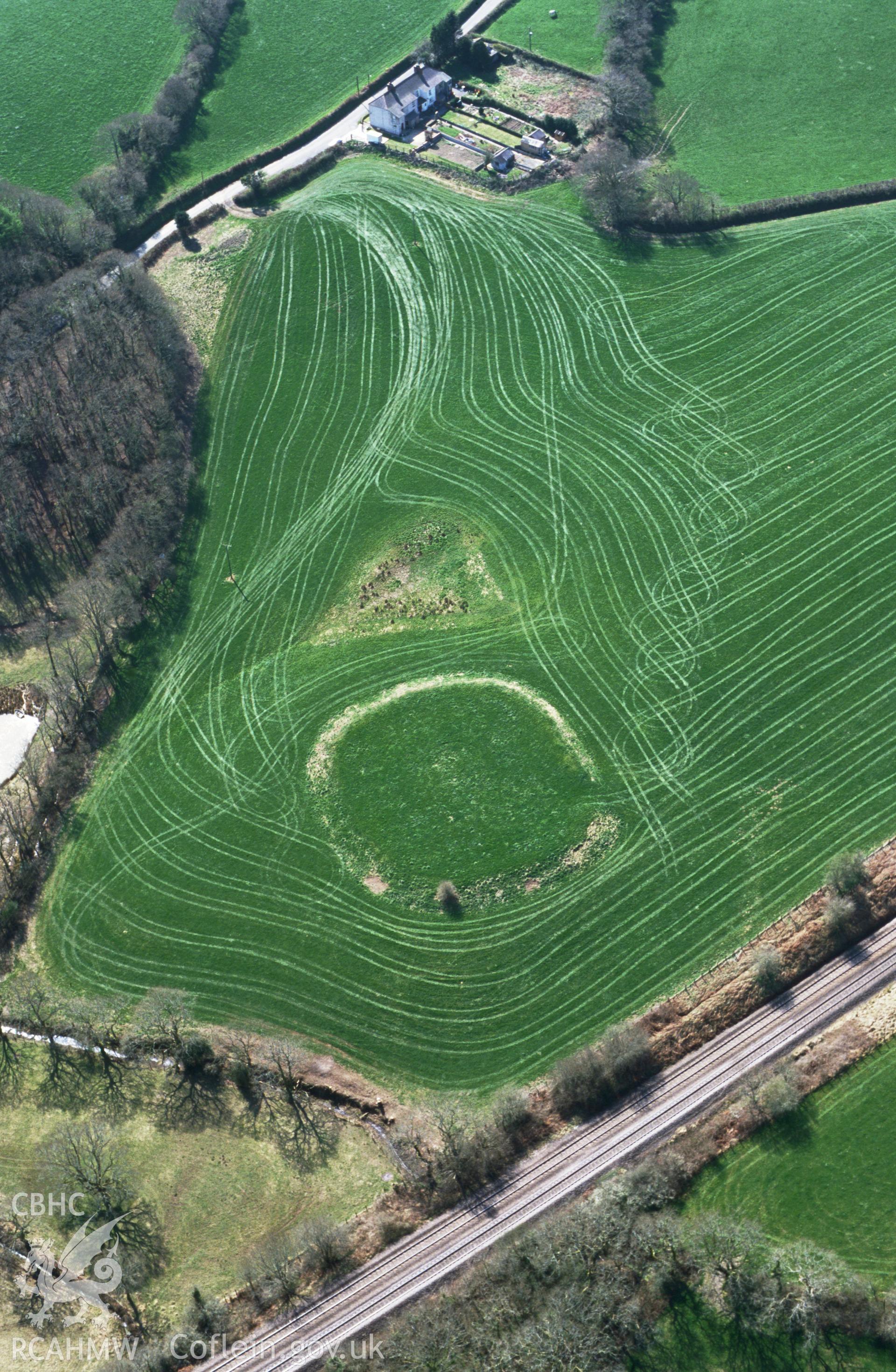 RCAHMW colour oblique aerial photograph of Gelli Camp, with scenic cropping/spraying patterns. Taken by Toby Driver on 10/04/2003