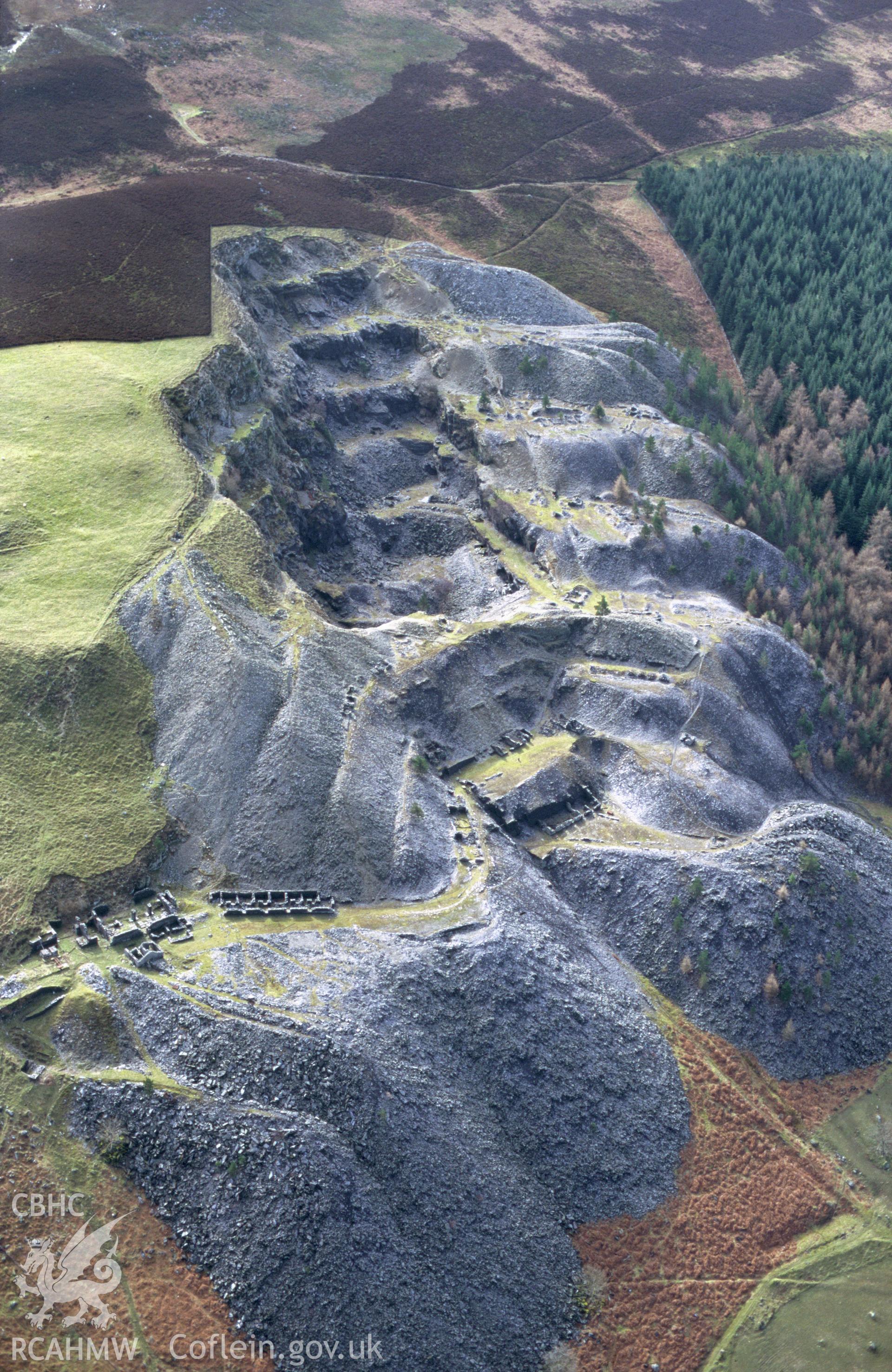 RCAHMW colour oblique aerial photograph of Penarth Slate Quarry, Corwen taken on 13/03/1995 by C.R. Musson