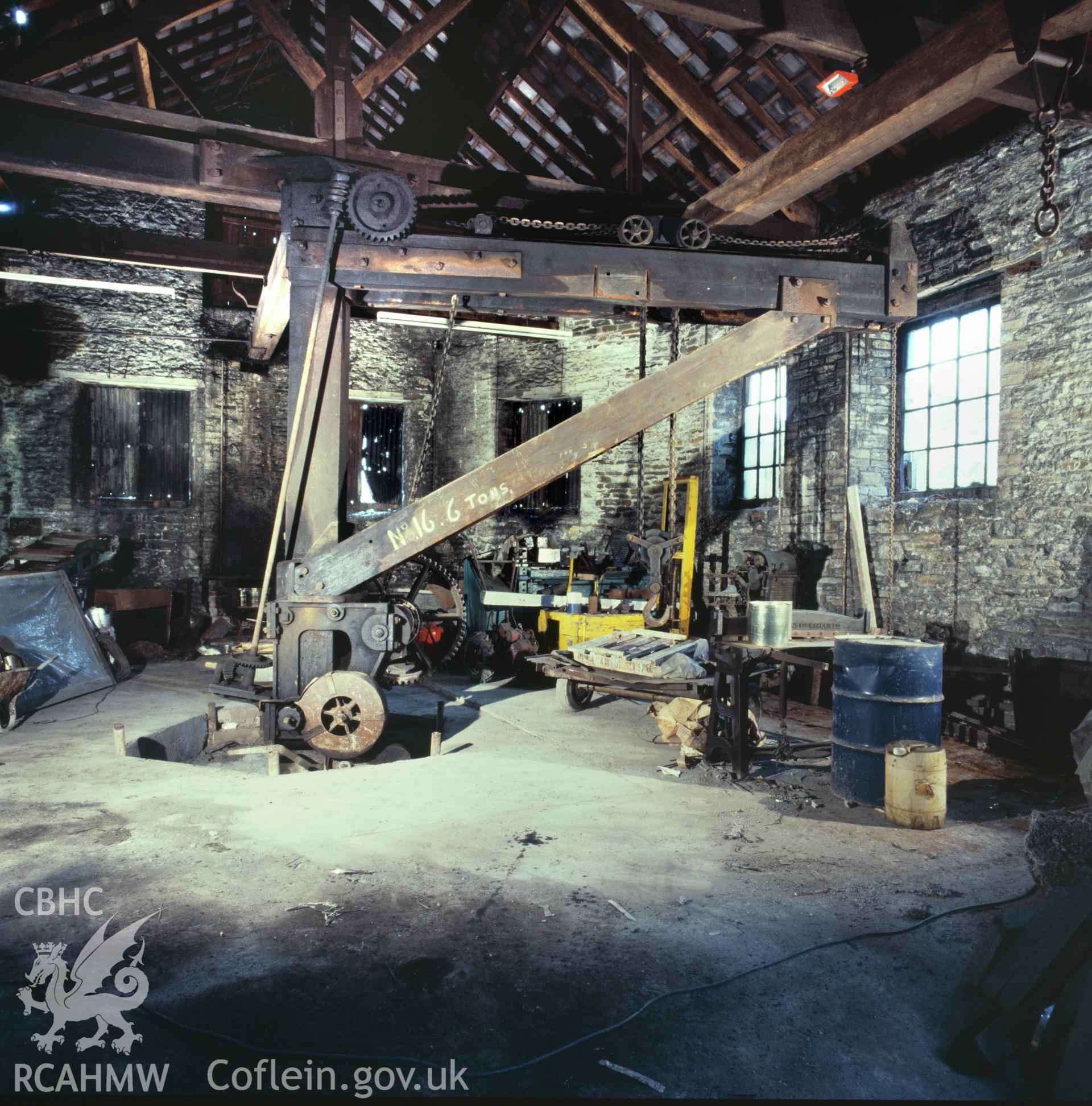 RCAHMW colour transparency of warehouse crane at Players Works, Clydach, taken by Iain Wright, 1979
