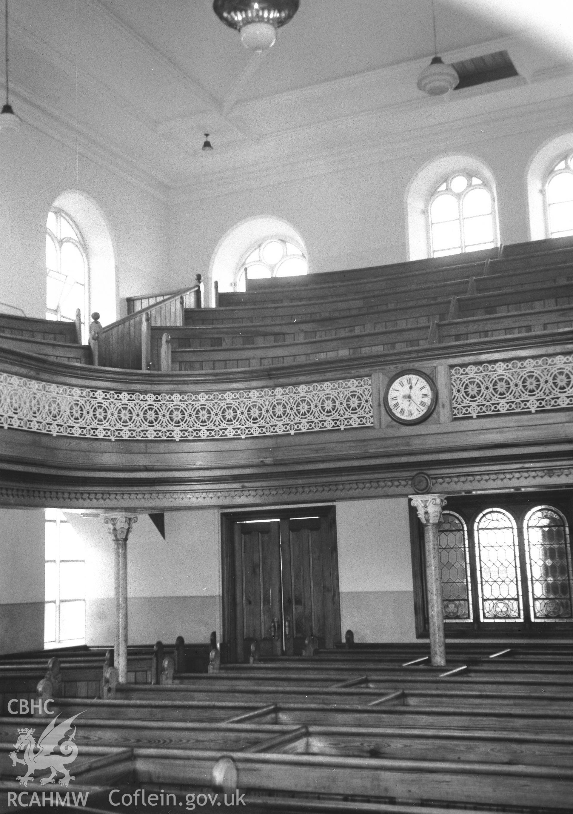 Digital copy of a black and white photograph showing an interior view of Gwernllwyn Independent Chapel, Llandyfriog, taken by Robert Scourfield, 1995.