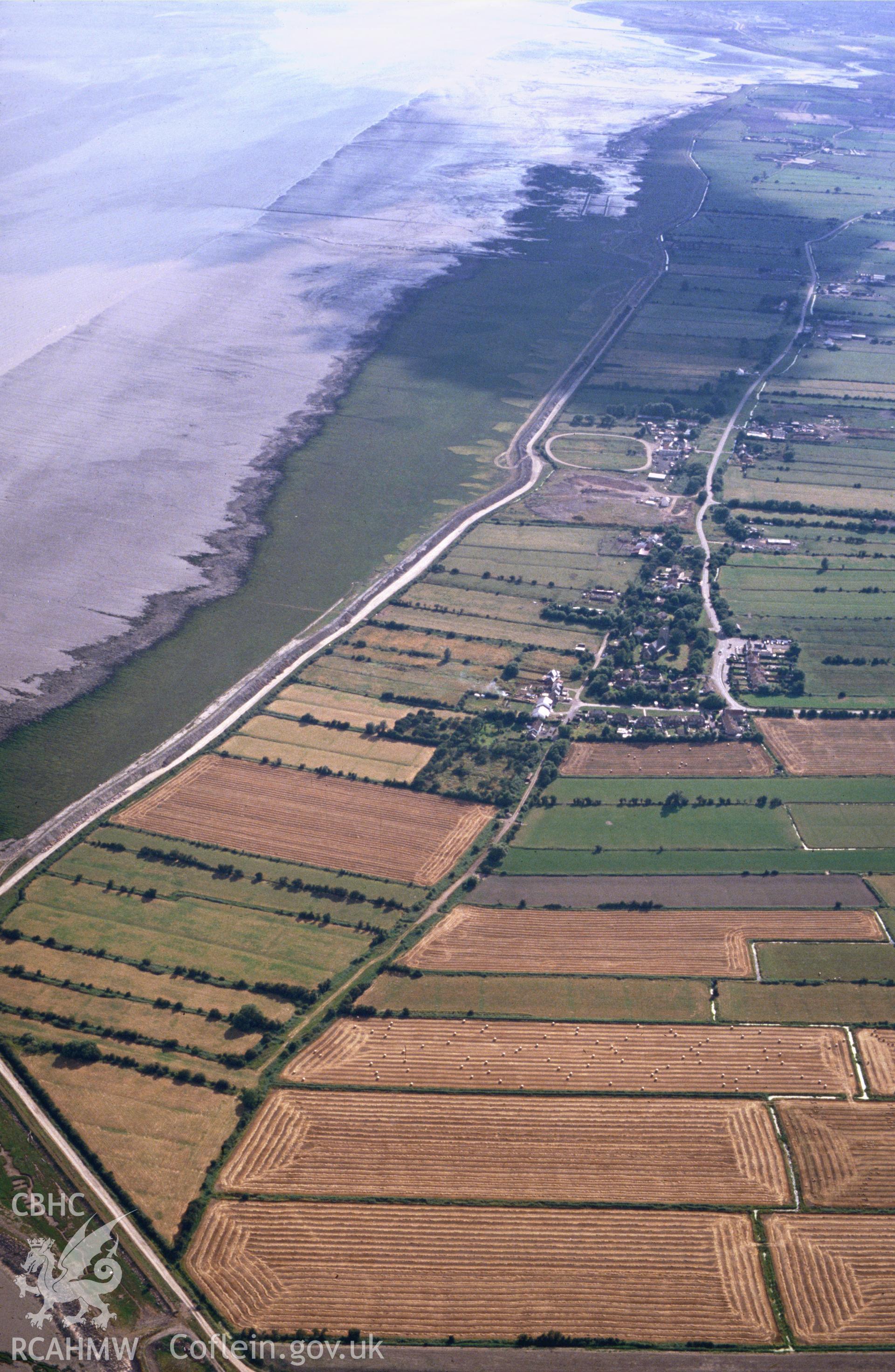 Slide of RCAHMW colour oblique aerial photograph of Wentlooge Levels, taken by C.R. Musson, 1990.