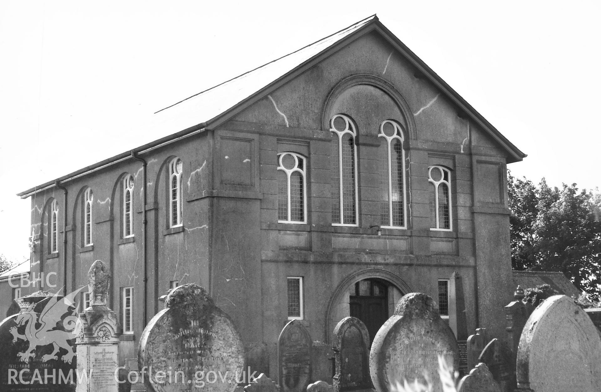 Digital copy of a black and white photograph showing a general view of Pisgah Independent Chapel. Llandyssilio, taken by Robert Scourfield, 1995.