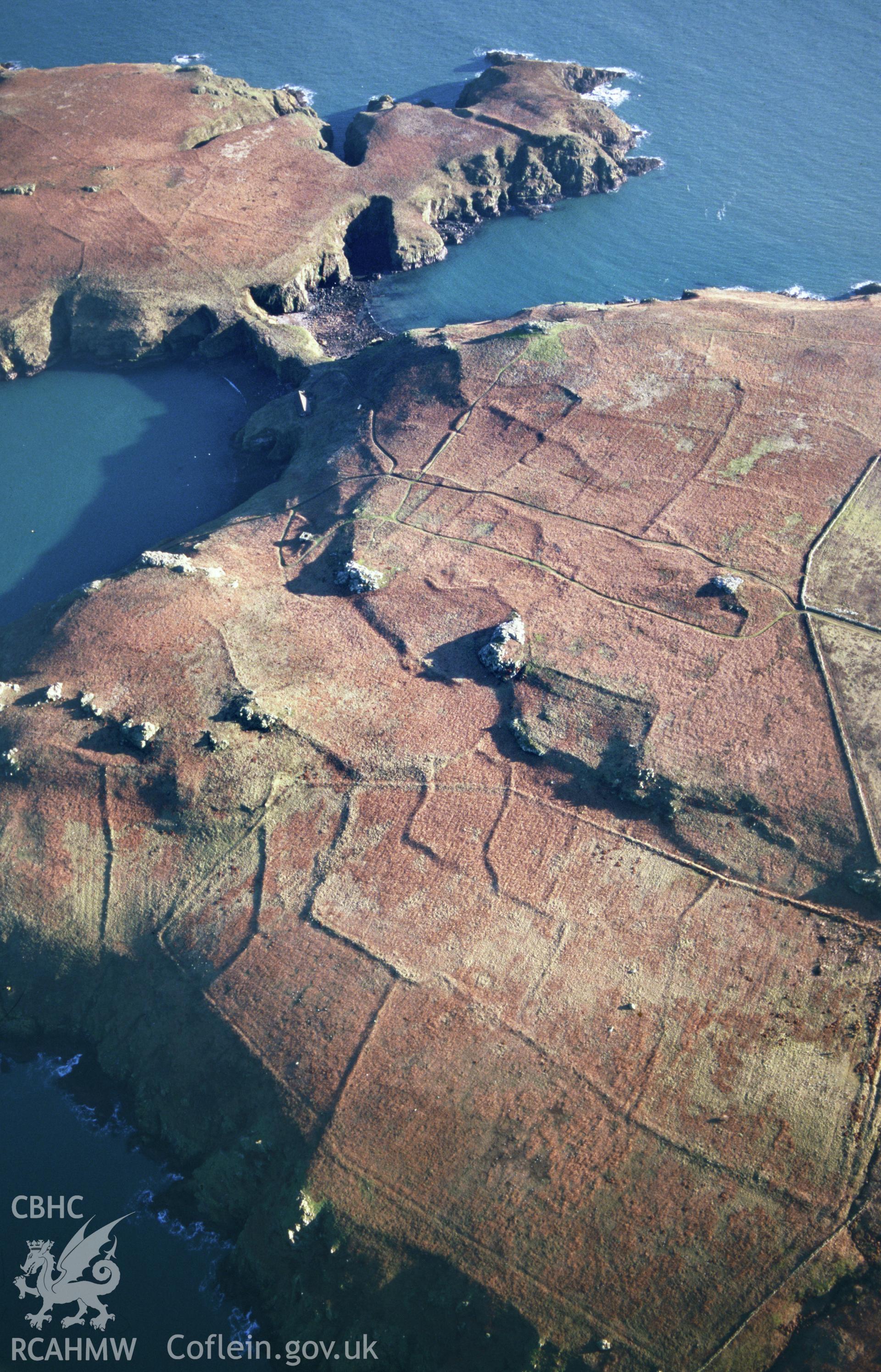 Slide of RCAHMW colour oblique aerial photograph of Skomer field system, taken by T.G. Driver, 2001.