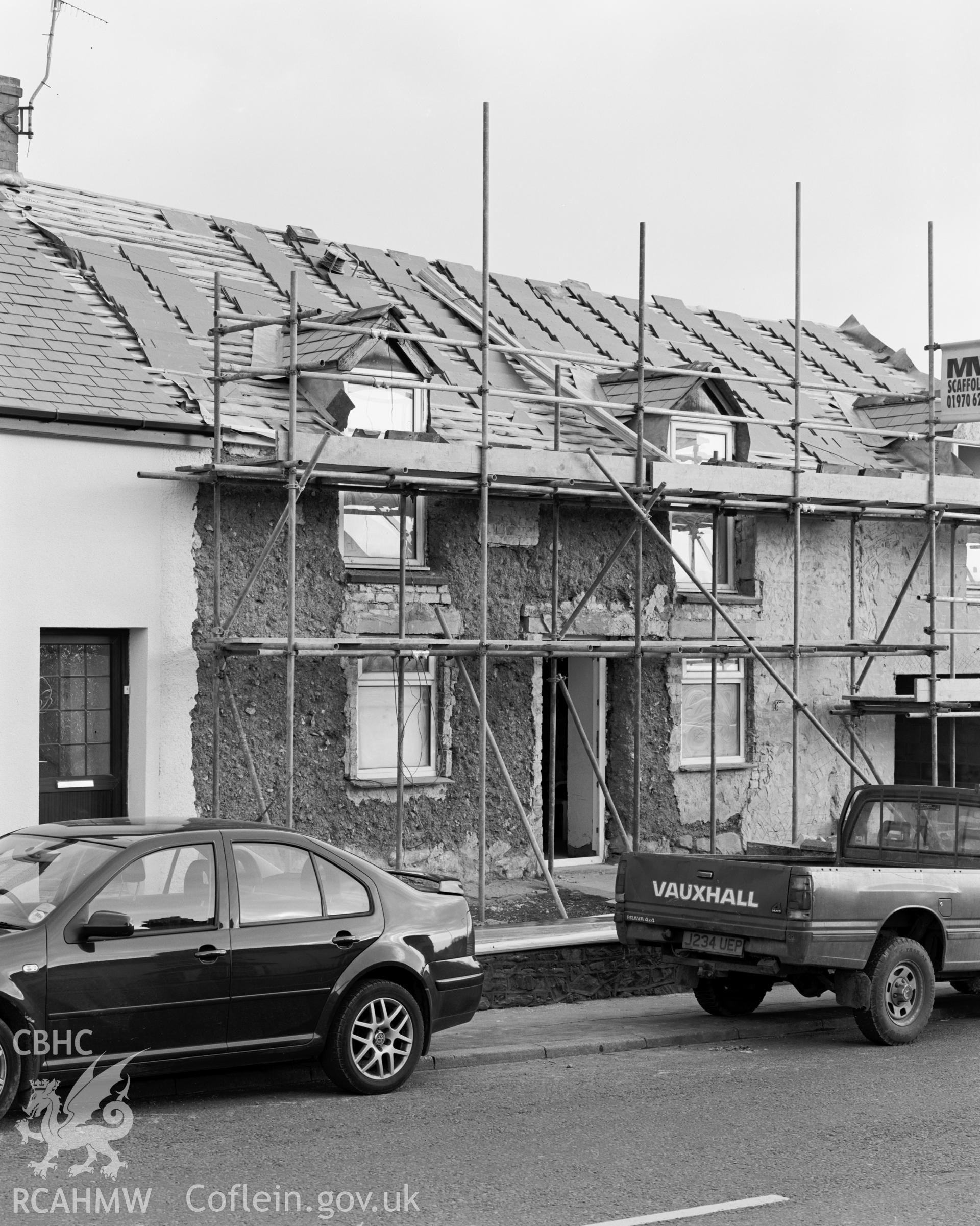 Glanceri, Bow Street, Aberystwyth; black and white photograph showing exposed cob construction, produced by Iain Wright, 2004.