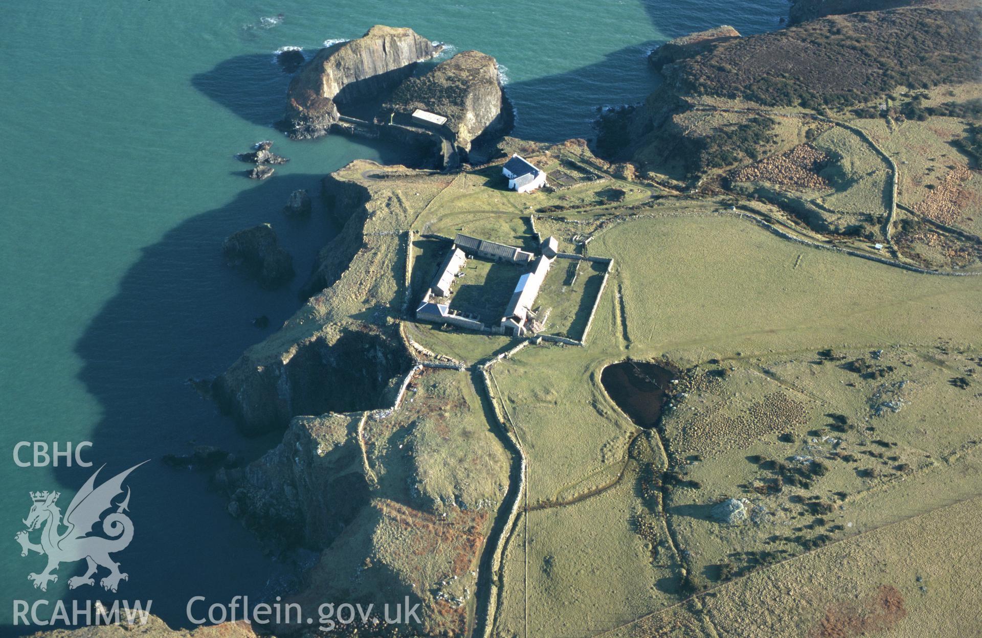 RCAHMW colour slide oblique aerial photograph of Ramsey Island Farm, St Davids and the Cathedral Close, taken by C.R.Musson on the 27/02/1996