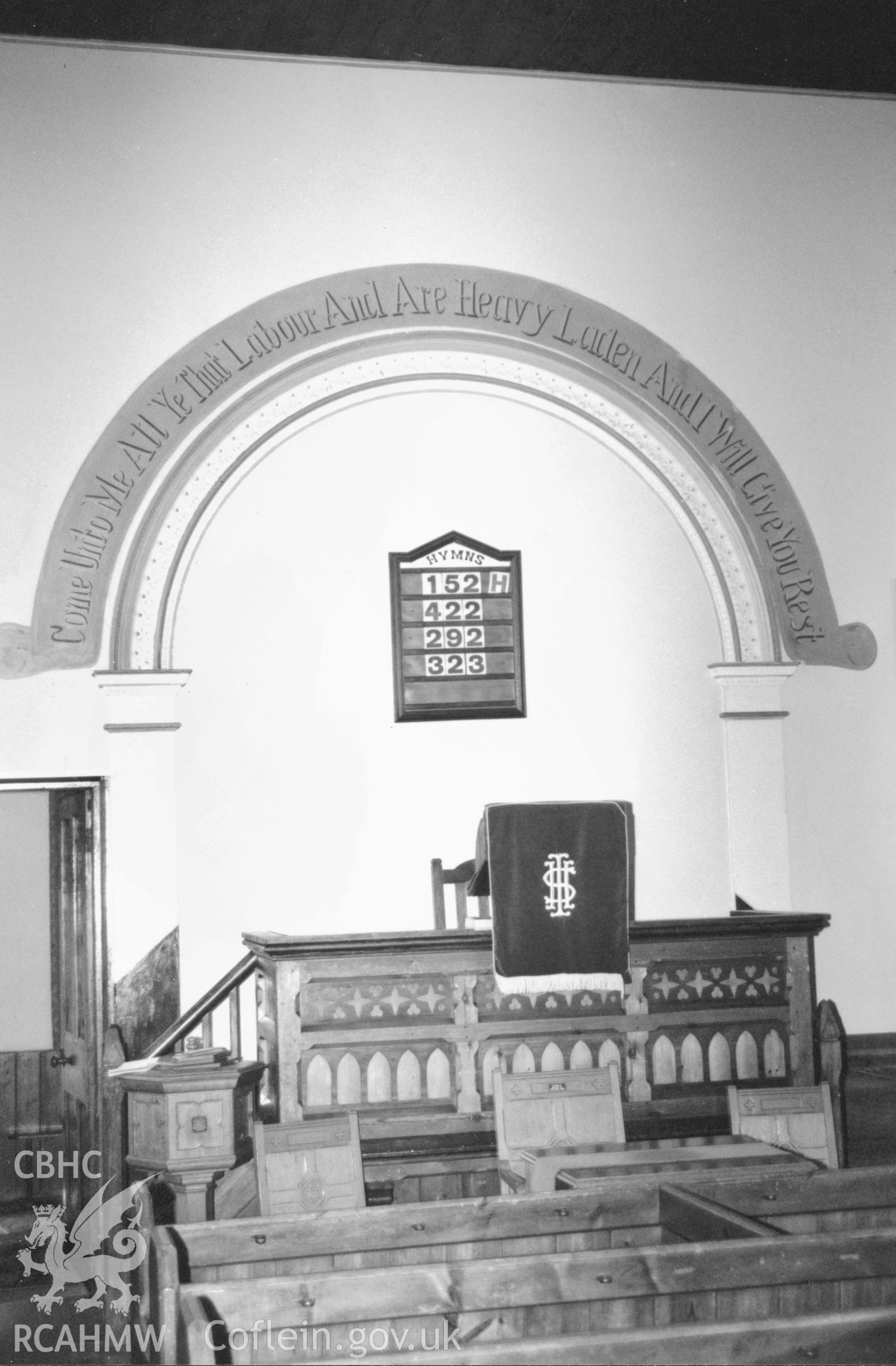 Digital copy of a black and white photograph showing an interior view of Gilead Calvinistic Methodist Chapel, taken by Robert Scourfield, 1996.