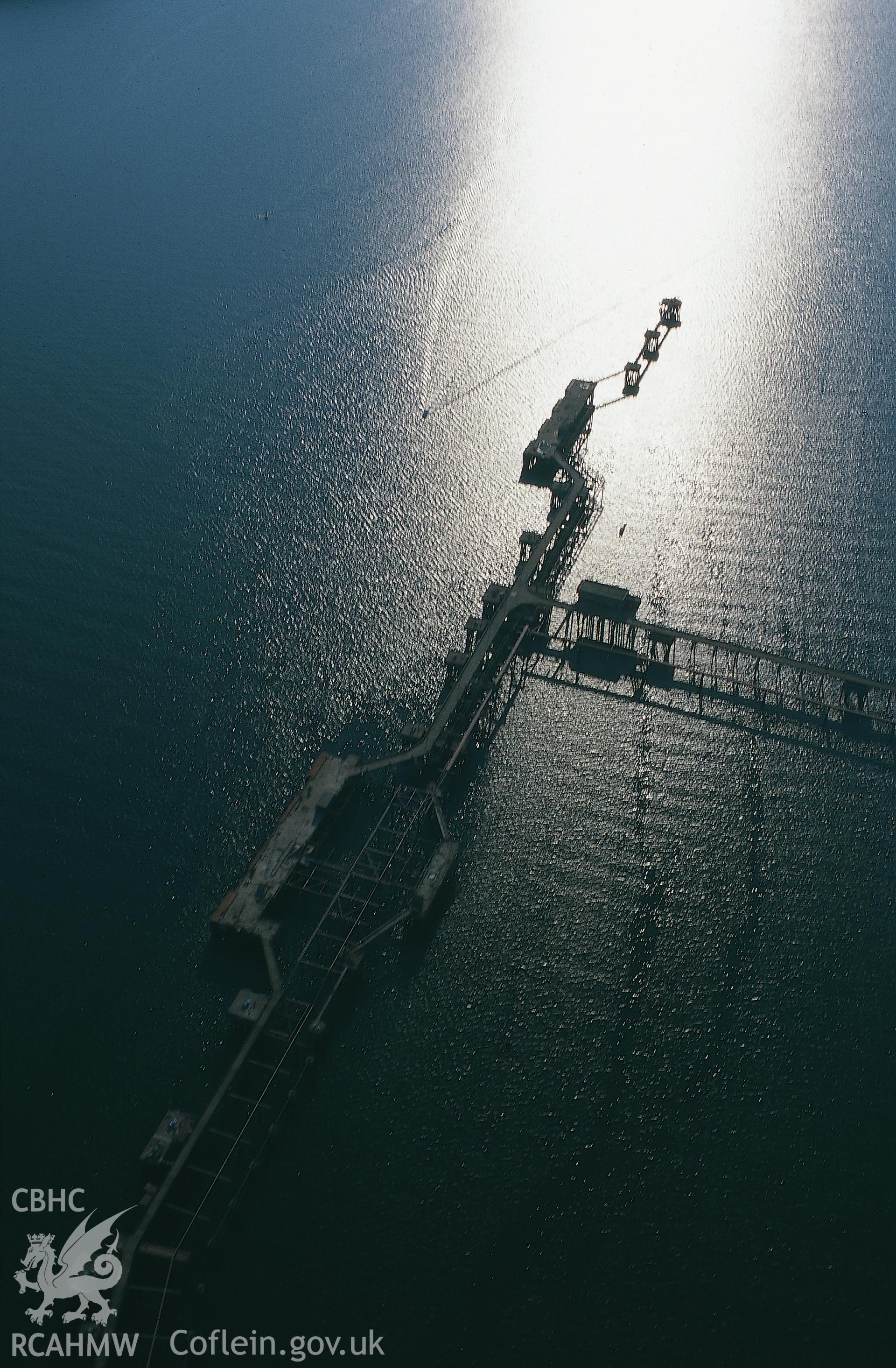 RCAHMW colour slide oblique aerial photograph of Milford Haven, jetty nr South Hook Point, Milford Haven, taken by T.G.Driver on the 23/08/2000