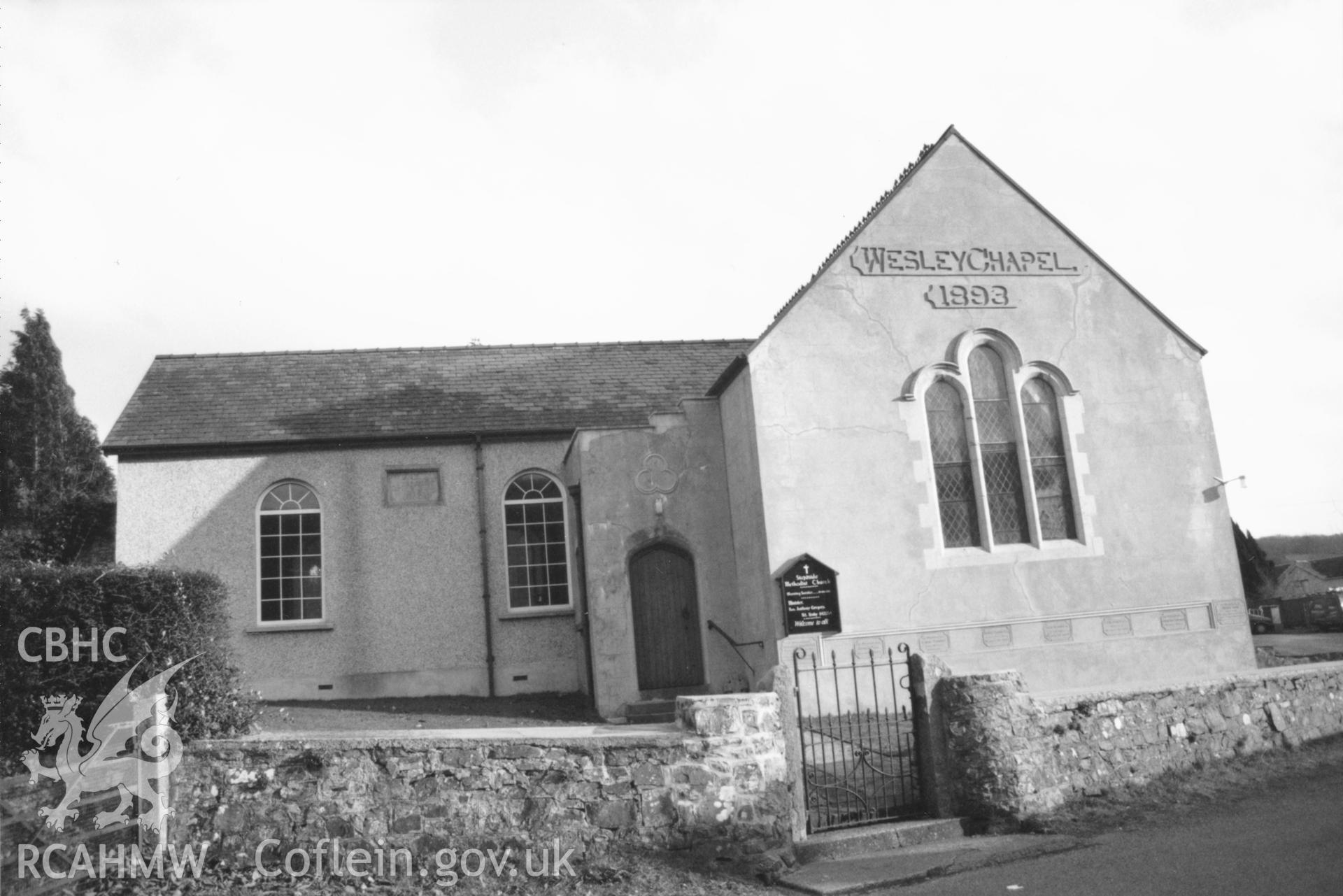 Digital copy of a black and white photograph showing an exterior view of Stepaside Wesleyan Methodist Chapel, taken by Robert Scourfield, 1996.