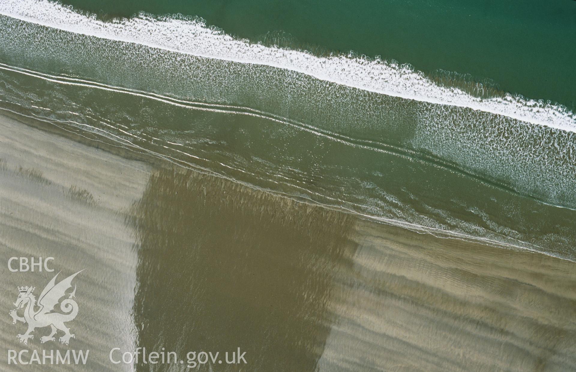 Slide of RCAHMW colour oblique aerial photograph showing beach patterns at Broadhaven, taken by Toby Driver, 2002.