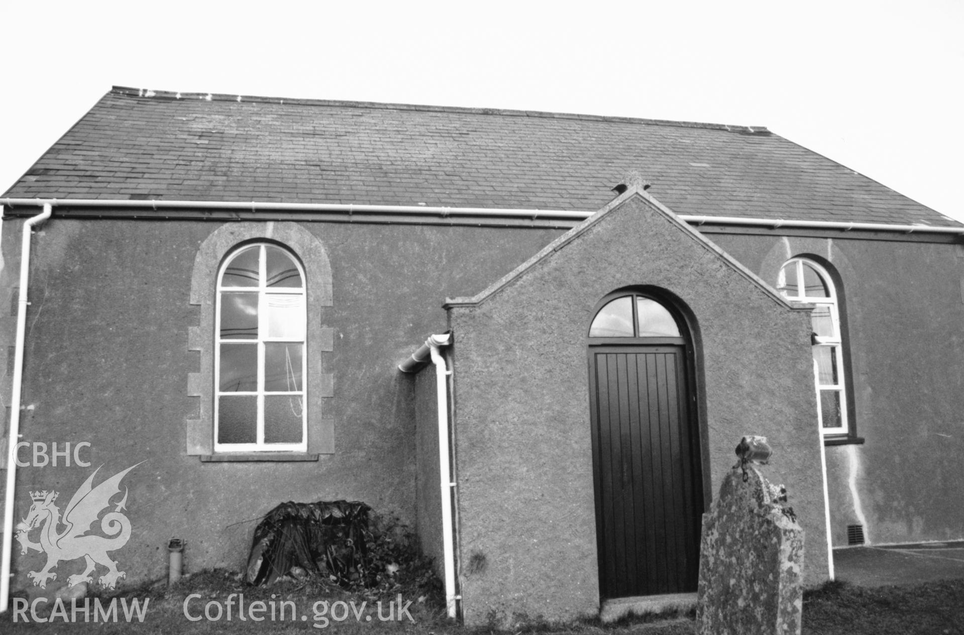 Digital copy of a black and white photograph showing an exterior view of Longstone Congregational Chapel, taken by Robert Scourfield, 1996.