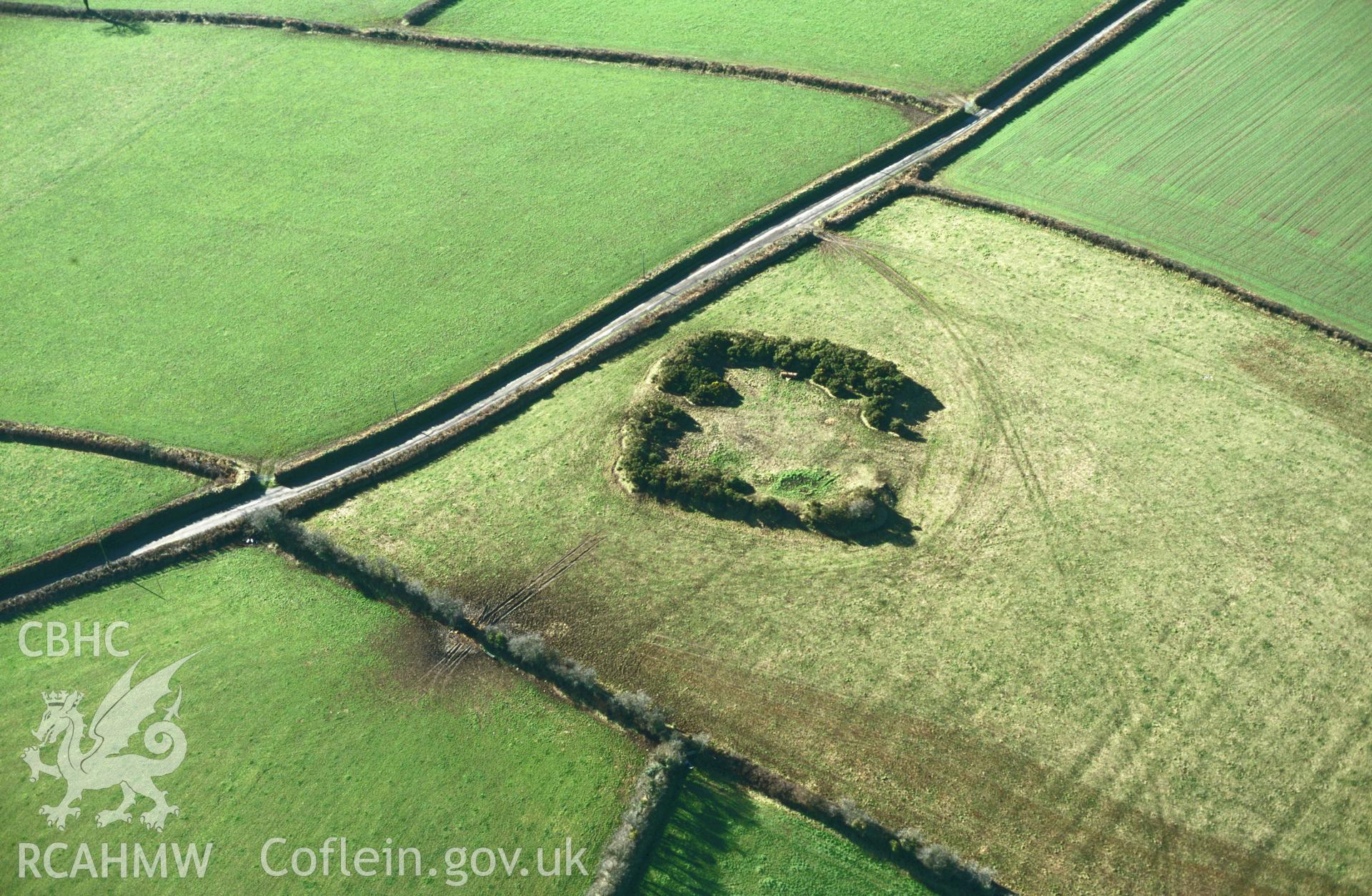 RCAHMW colour slide oblique aerial photograph of Knock Rath; Holmes Ring, Wiston, taken by C.R.Musson on the 07/02/1997