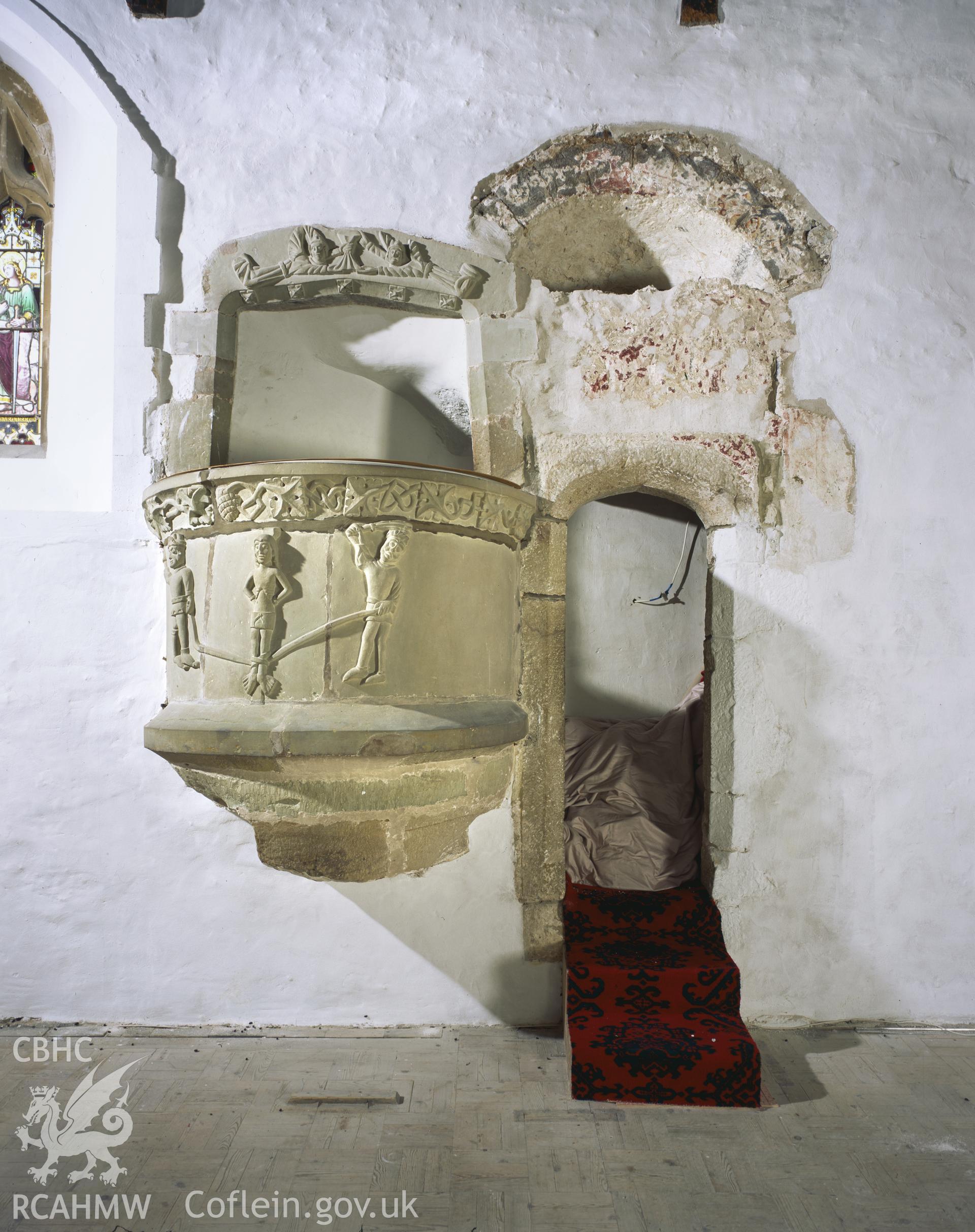 Colour transparency showing  the remains of arch decoration in the pulpit at St John the Baptist Church, Newton Nottage, produced by Iain Wright 2004