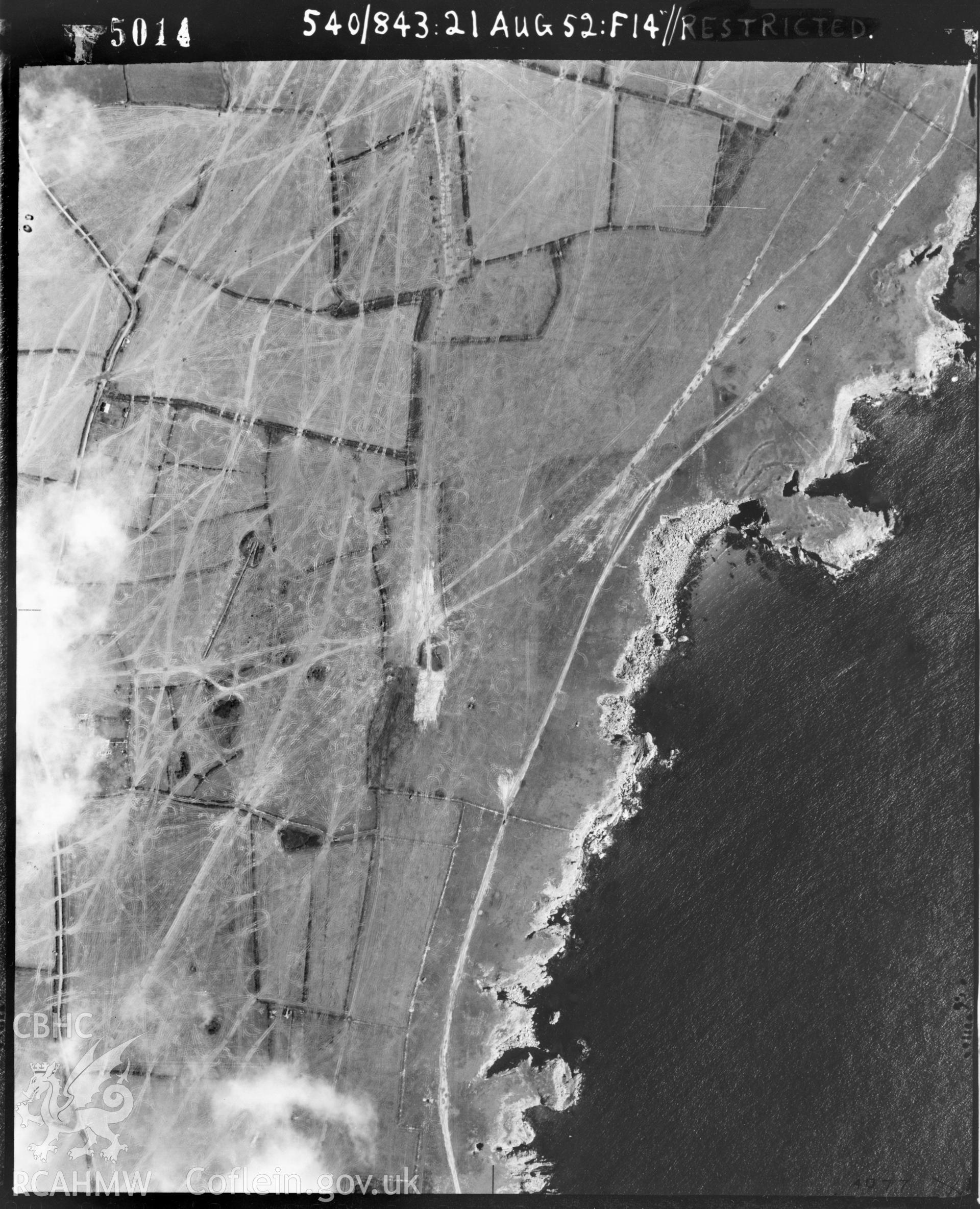 Black and white oblique aerial photograph taken by the RAF in 1952, centred on Buckspool  Camp.