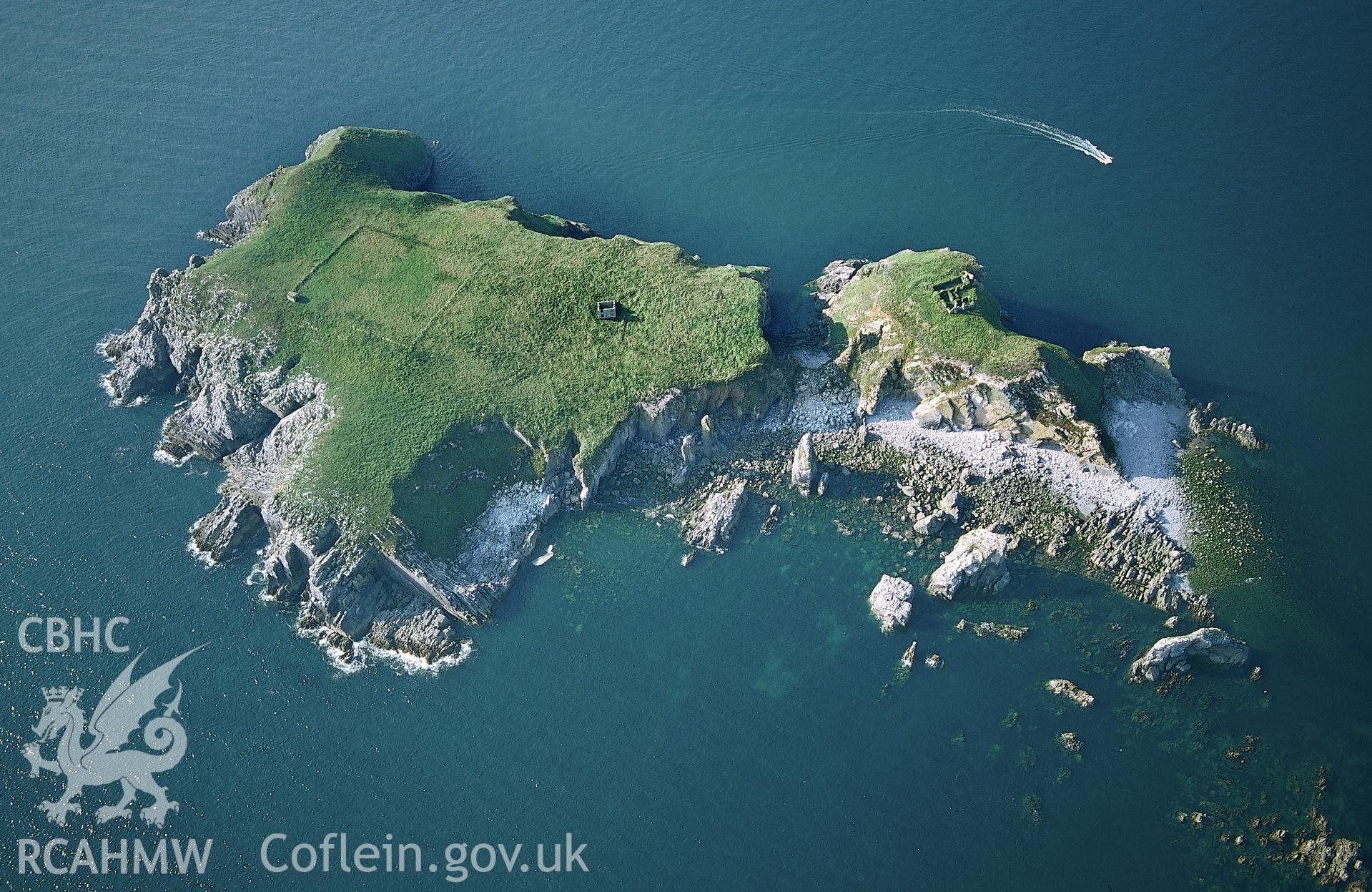 RCAHMW colour oblique aerial photograph of St Margaret's Island, ruins, general view. Taken by Toby Driver on 02/09/2002