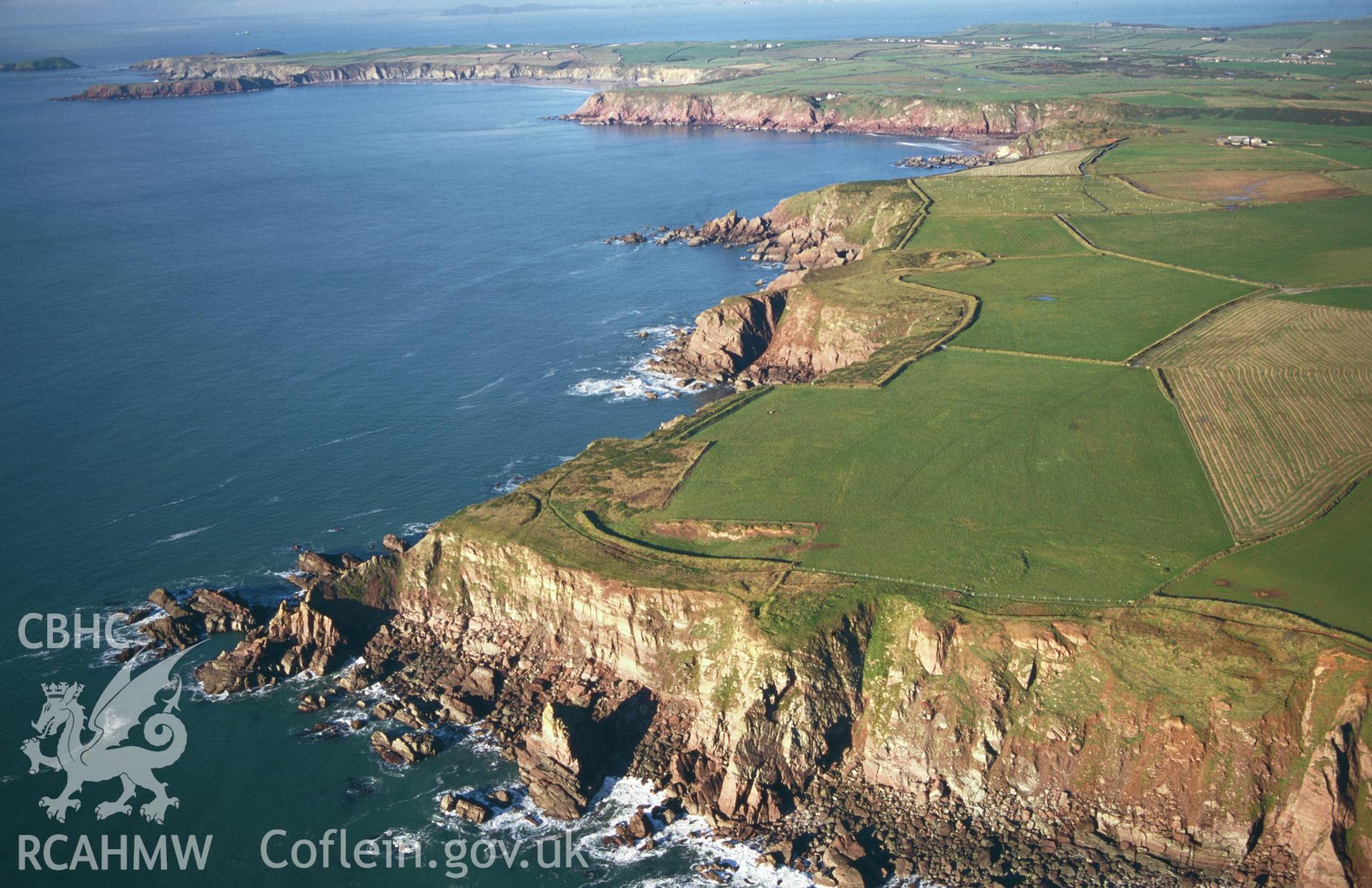 RCAHMW colour slide oblique aerial photograph of Little Castle Point, taken by T.G.Driver on the 03/12/1997