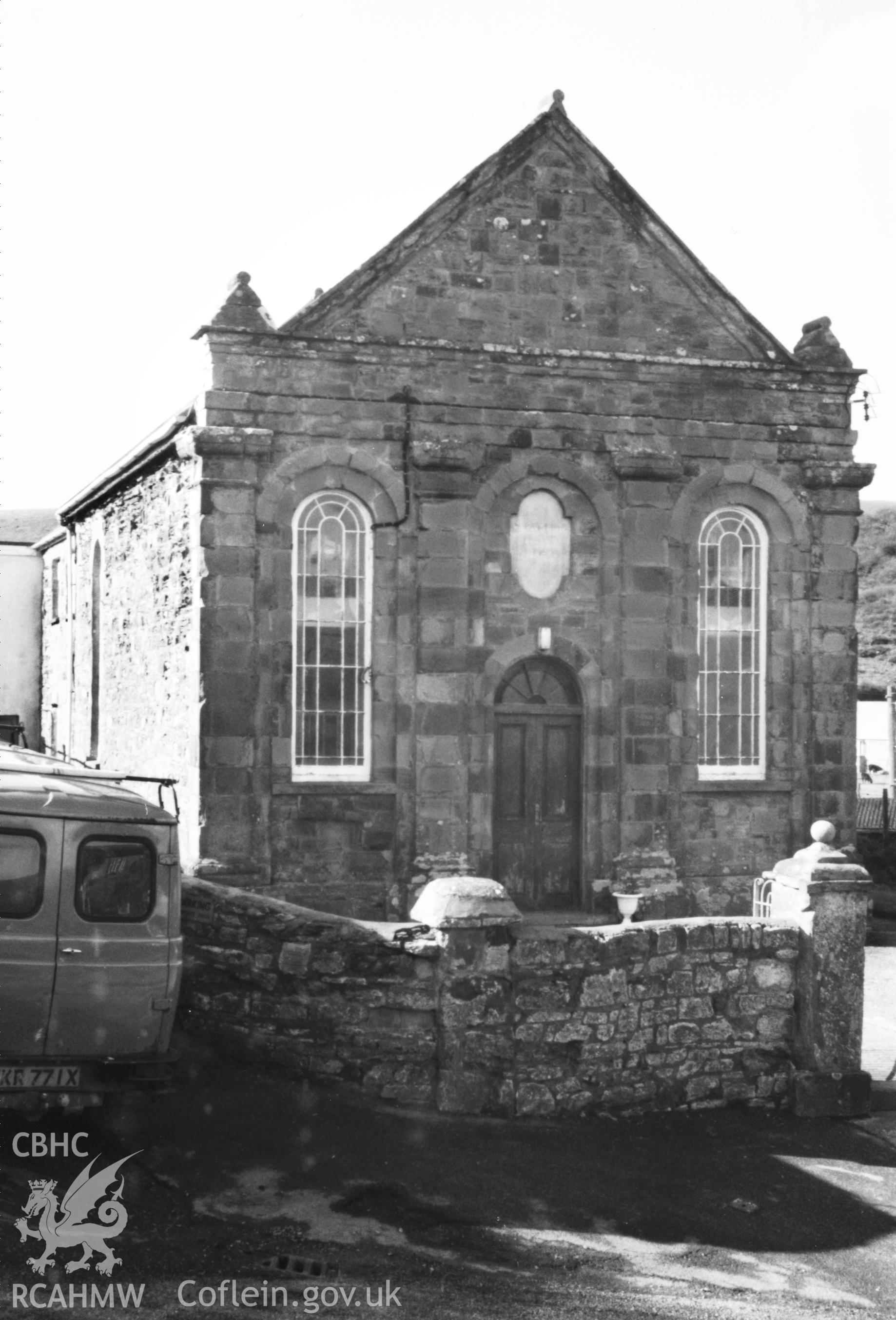 Digital copy of a black and white photograph showing an exterior view of Nolton Haven Congregational Chapel, taken by Robert Scourfield, 1996.